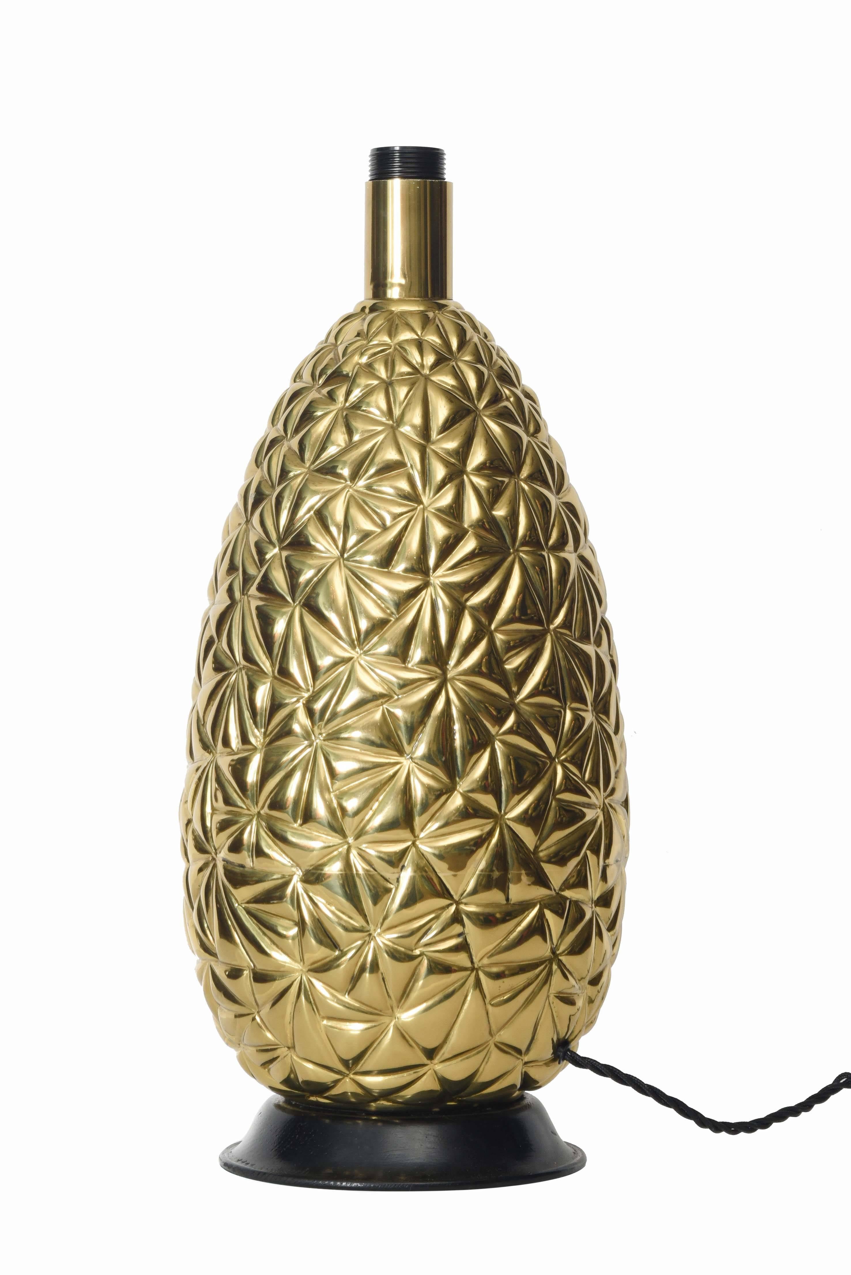 Brass pineapple table lamp.

(The height of the lamp shown in measurements it was taken without the lampshade which is not included)