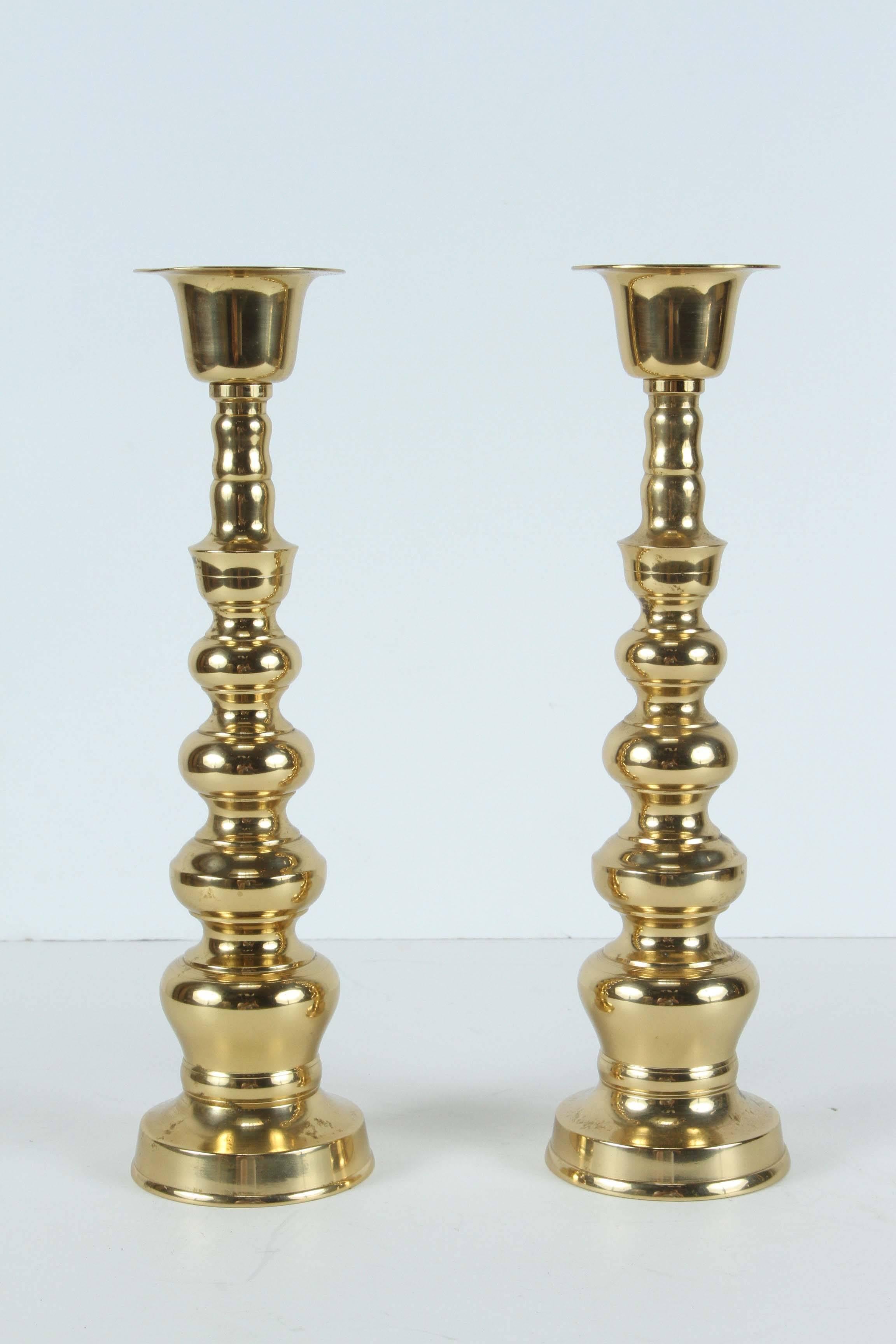 Pair of polished cast gold Victorian brass candlesticks.
Mid-Century Modern vintage Chinese export candle holders.