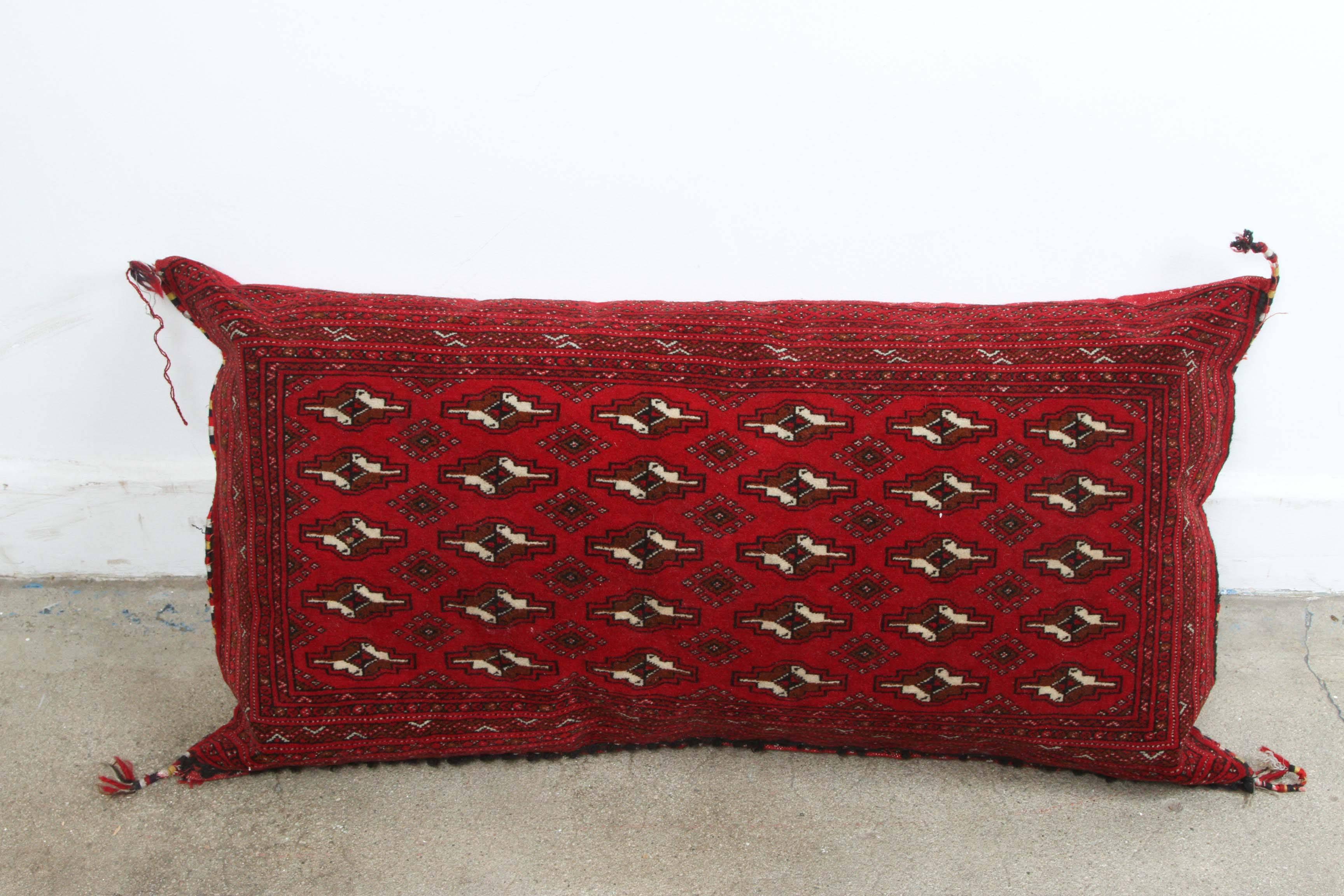Large hand-woven Turkish red tribal pillows, made from vintage pile rug.
Pair of pillows, very similar in colors but different design and one looks faded as the other one.
Deep Moroccan red burgundy with black and white Moorish geometric design.