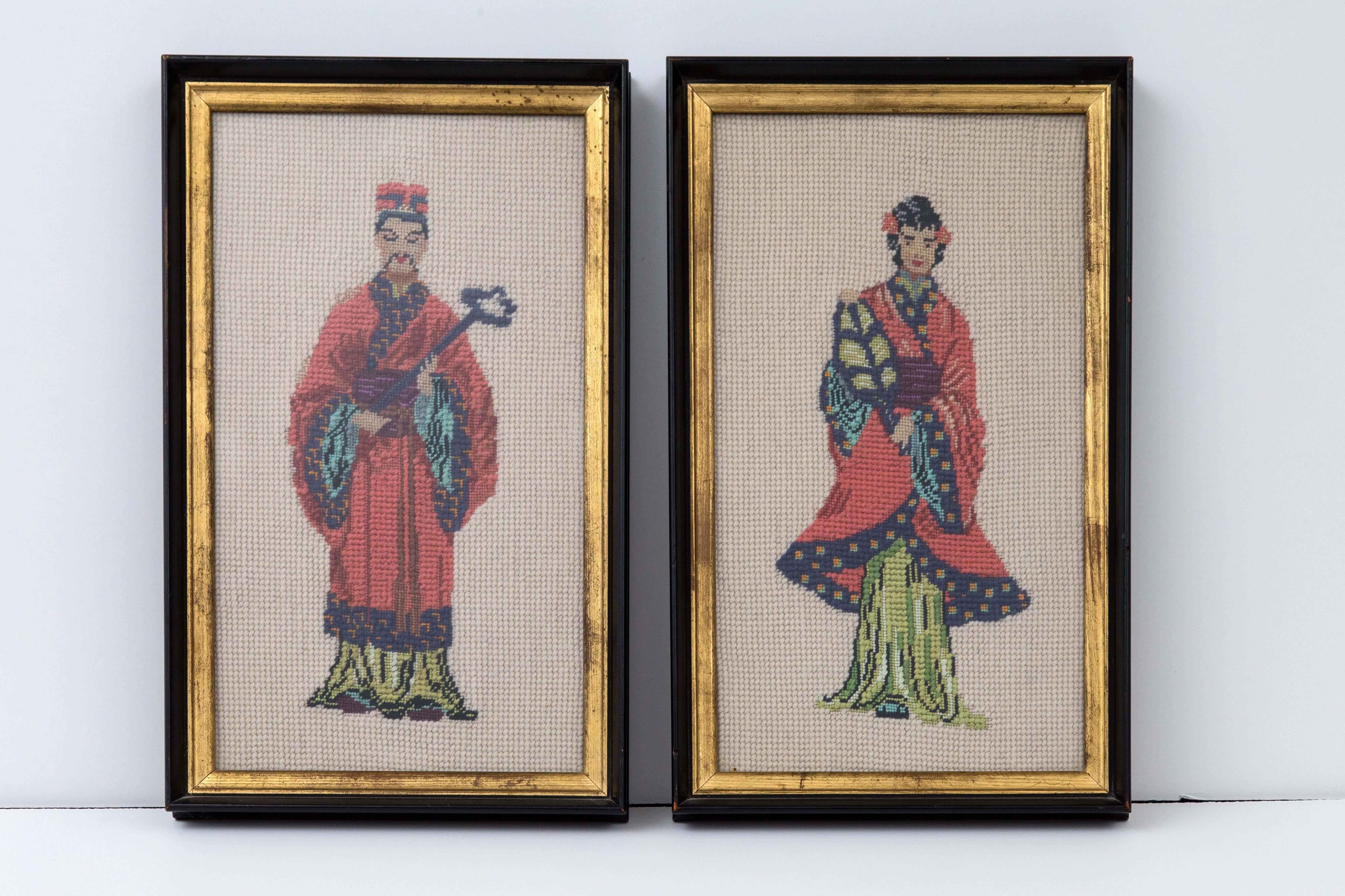 Vintage hand-knotted Chinese bride and groom encased in ebony and gilt frame. Good Fortune will be set upon the bride and groom or the anniversary gift of these two vintage 1960s hand-knotted with Royal colors. Beautifully done.