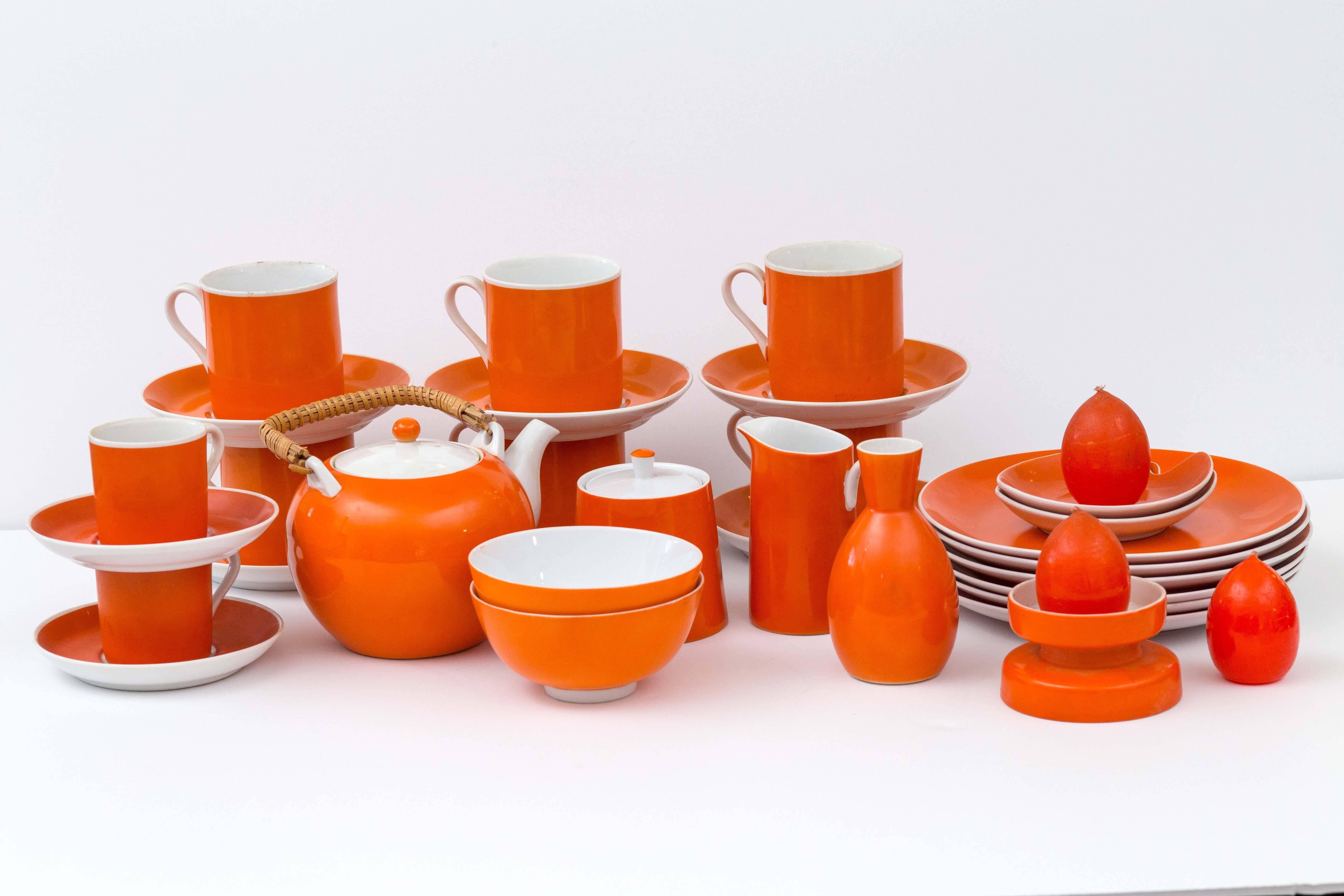 A 31 piece vintage porcelain Tangerine orange dessert set (and same colored candles). A Mid-Century Tangerine Orange adds a Pop of Life and as Frank Sinatra said 