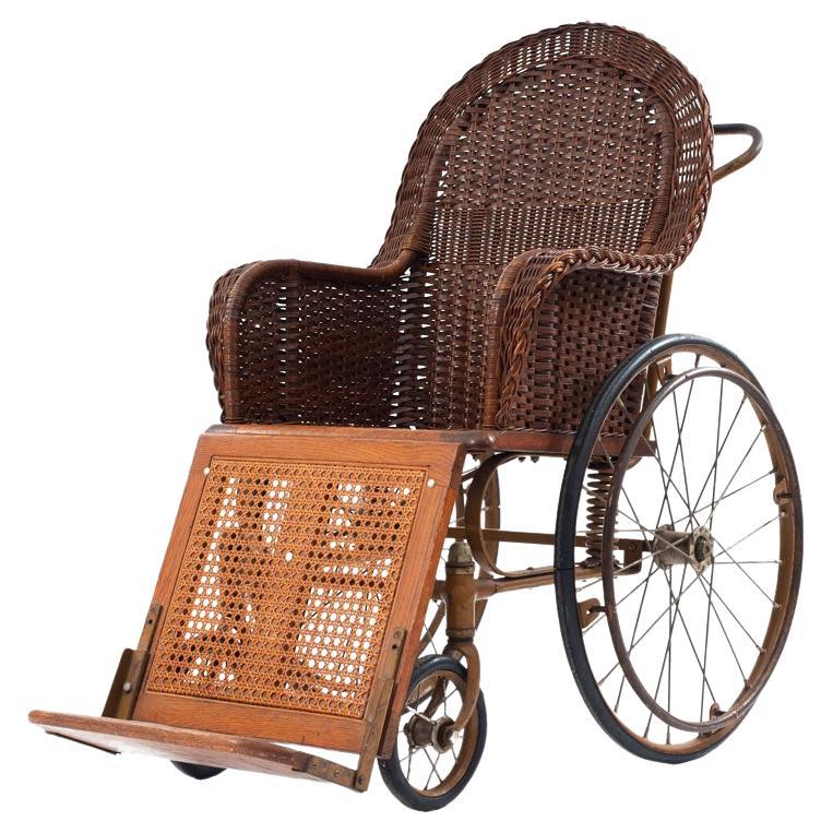 19th Century American Victorian Oak Wheelchair with Woven Wicker Back For Sale