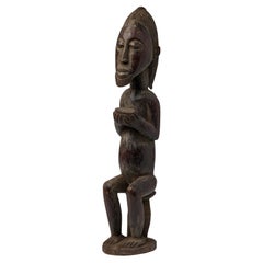 African Côte d'Ivoire Carved Wooden Figure, Tribal Style, 20th Century