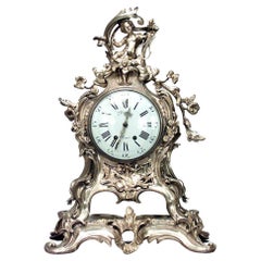 French Louis XV-Style Bronze Dore Cupid Clock, 19th Century, Paris