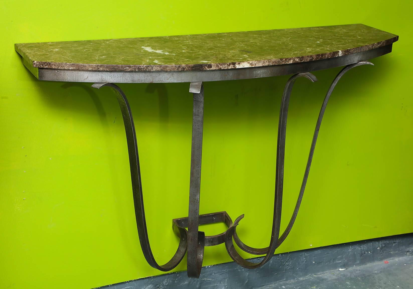 A 1930s, French Art Deco handwrought iron and marble console.