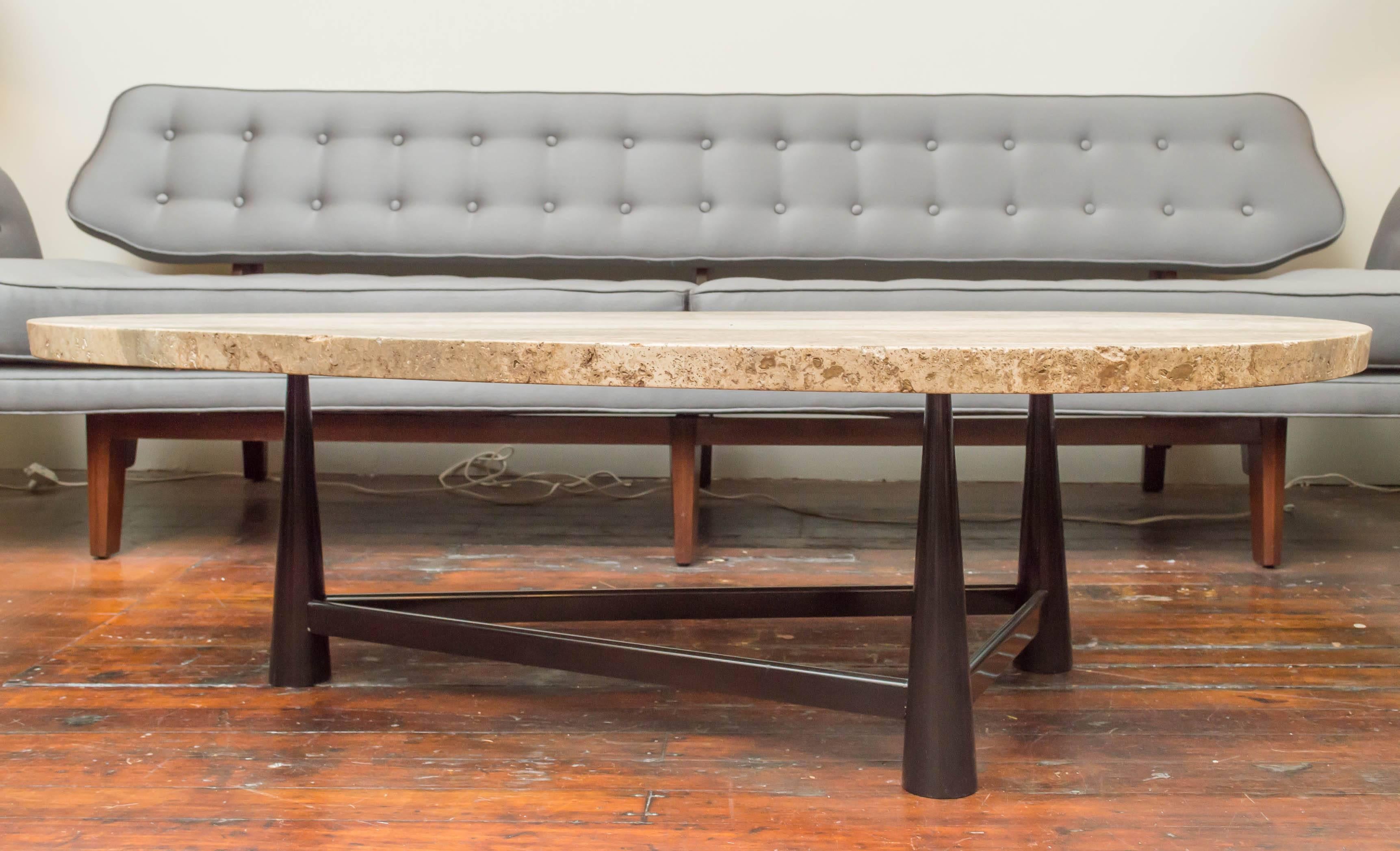 Rare design coffee table by Edward Wormley for Dunbar, model 521. Triangular base made of black lacquered aluminum with Italian travertine marble top, stamped.