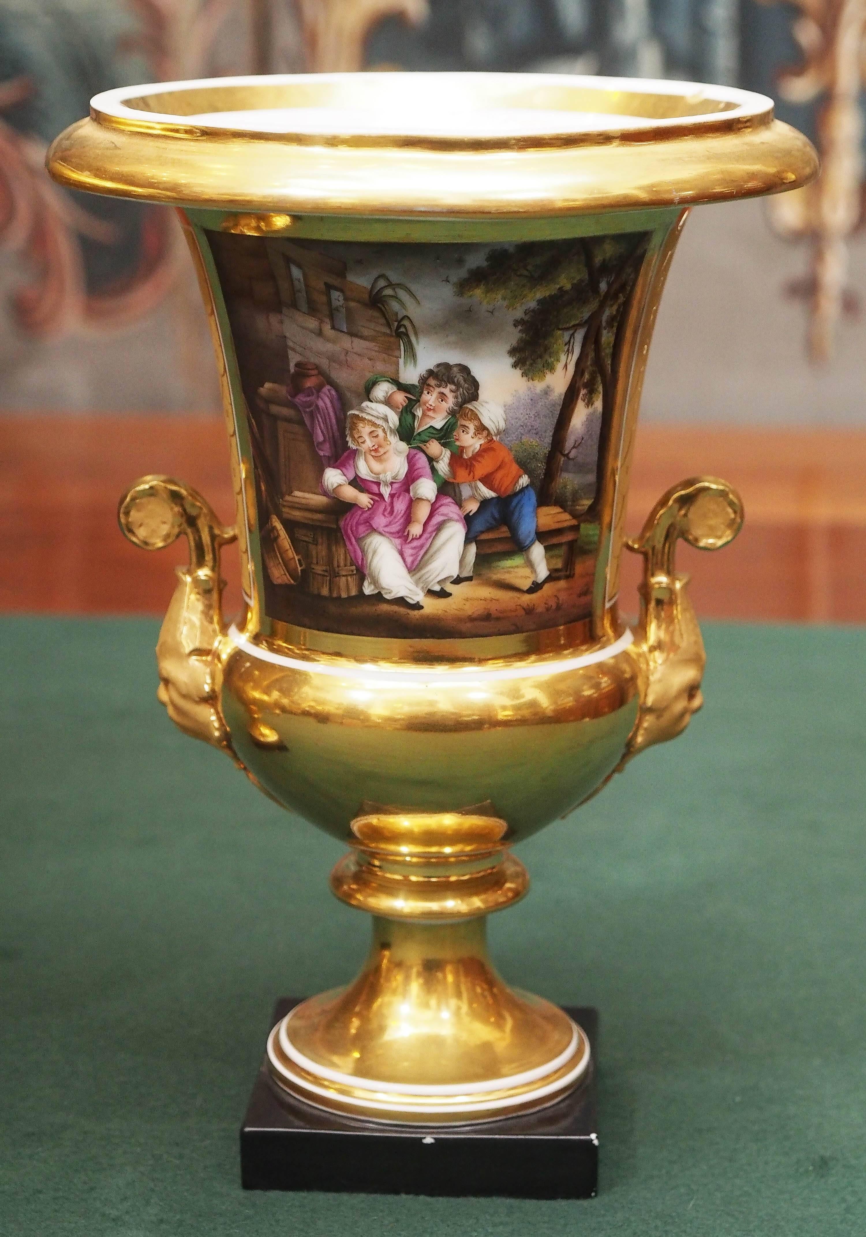 Pair of Vieux Paris Campagna form urns with genre scenes and pastoral scenes.