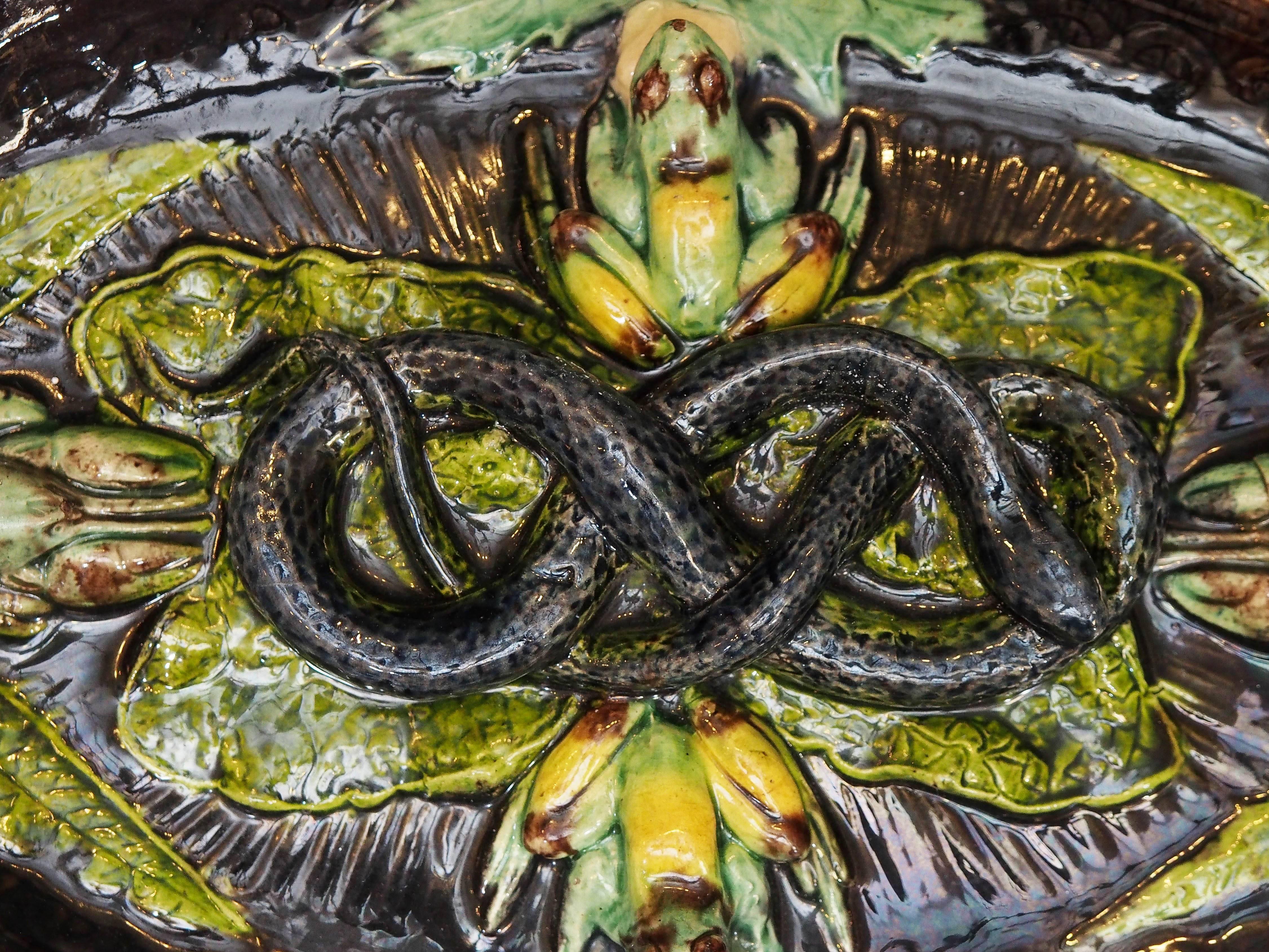 Portuguese Palissy style platter with snakes, snails and other 