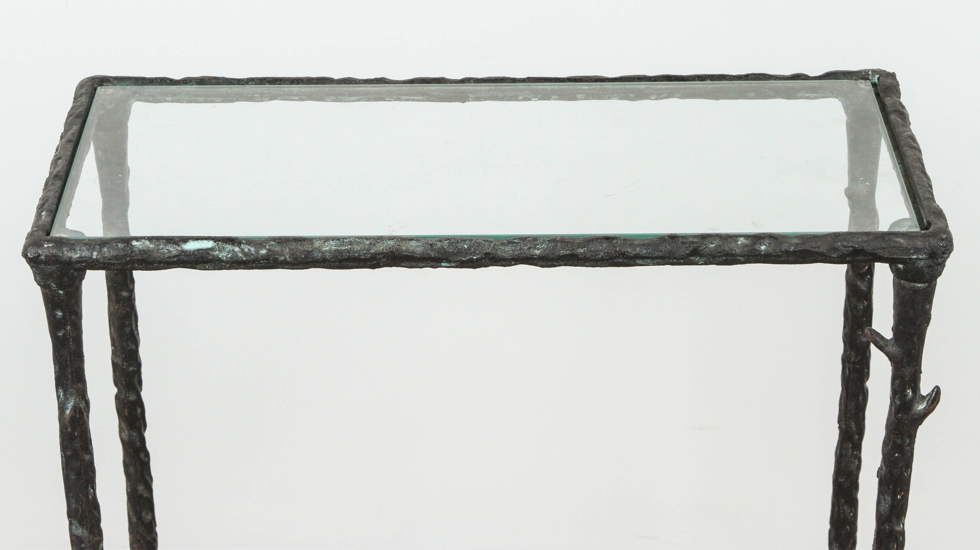 Wrought iron and glass console in the style of Giacometti.