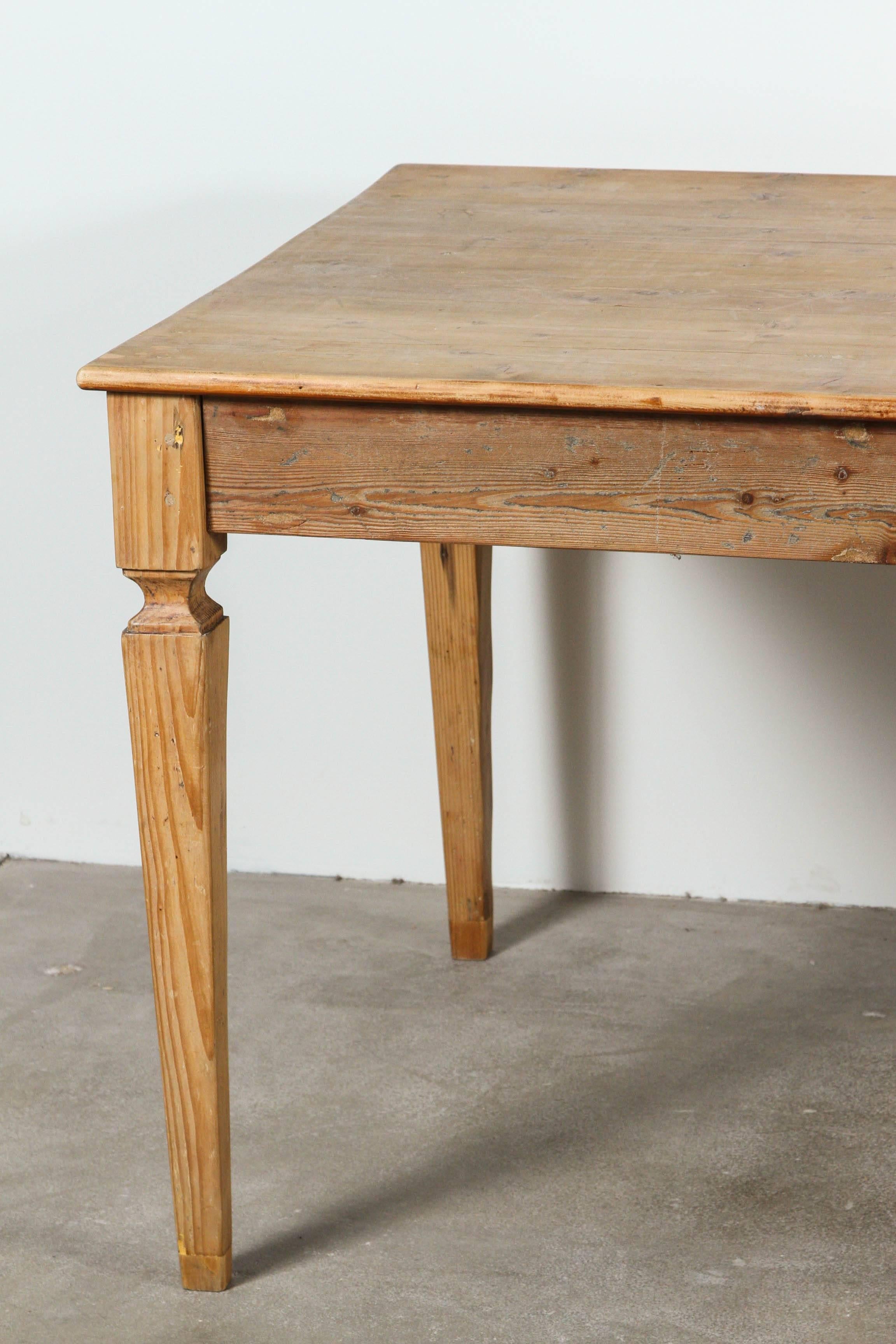 Rustic Italian pine farm table with obelisk tapered legs and a single pull-out drawer.