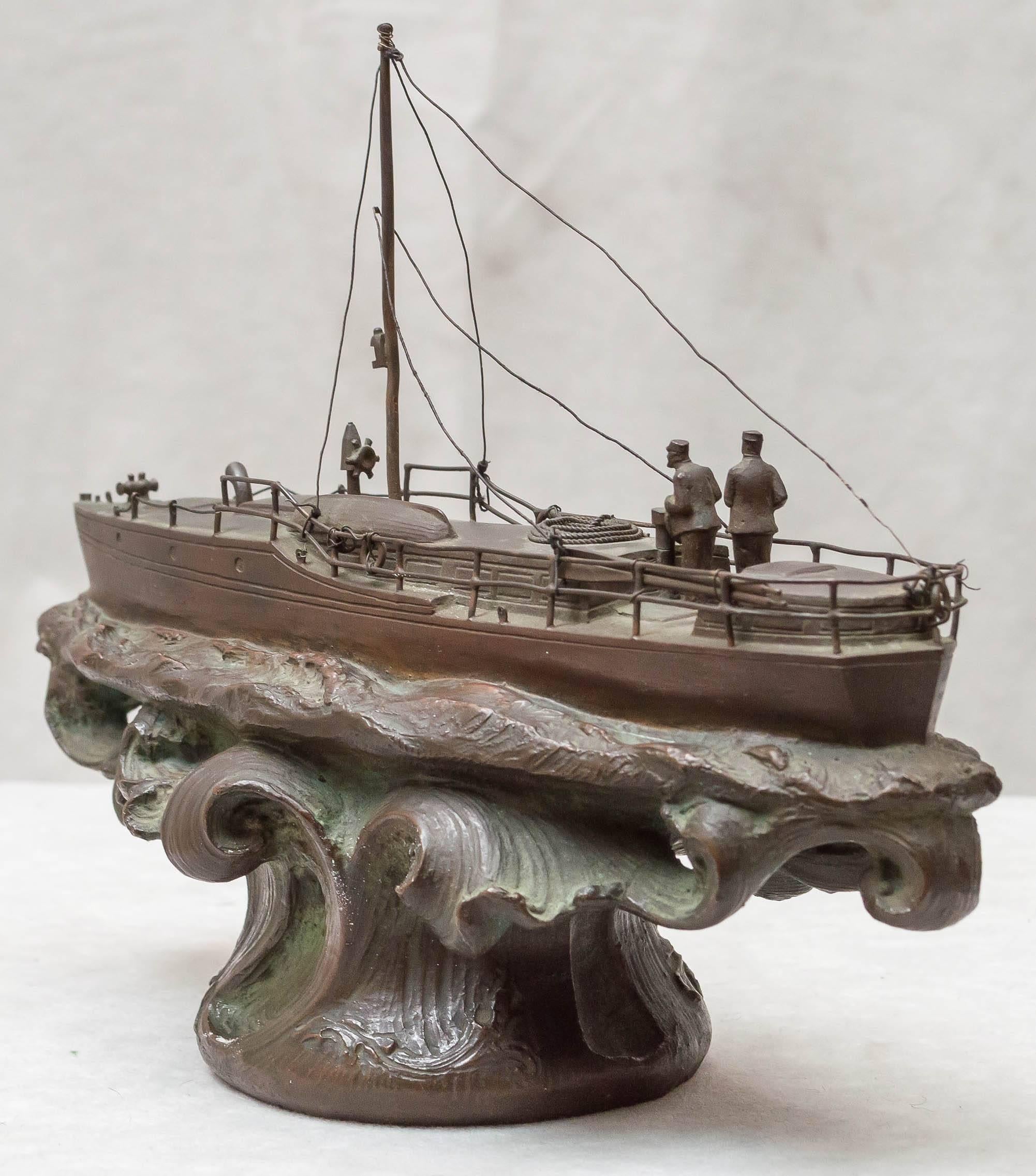 We are bronze dealers as many of you already know. We have here something very special. This is a model of the Ilys racing boat that won several races at the turn of the century. This 50 ft motor was owned by J.G.N. Whitaker of the Yactsman Club of