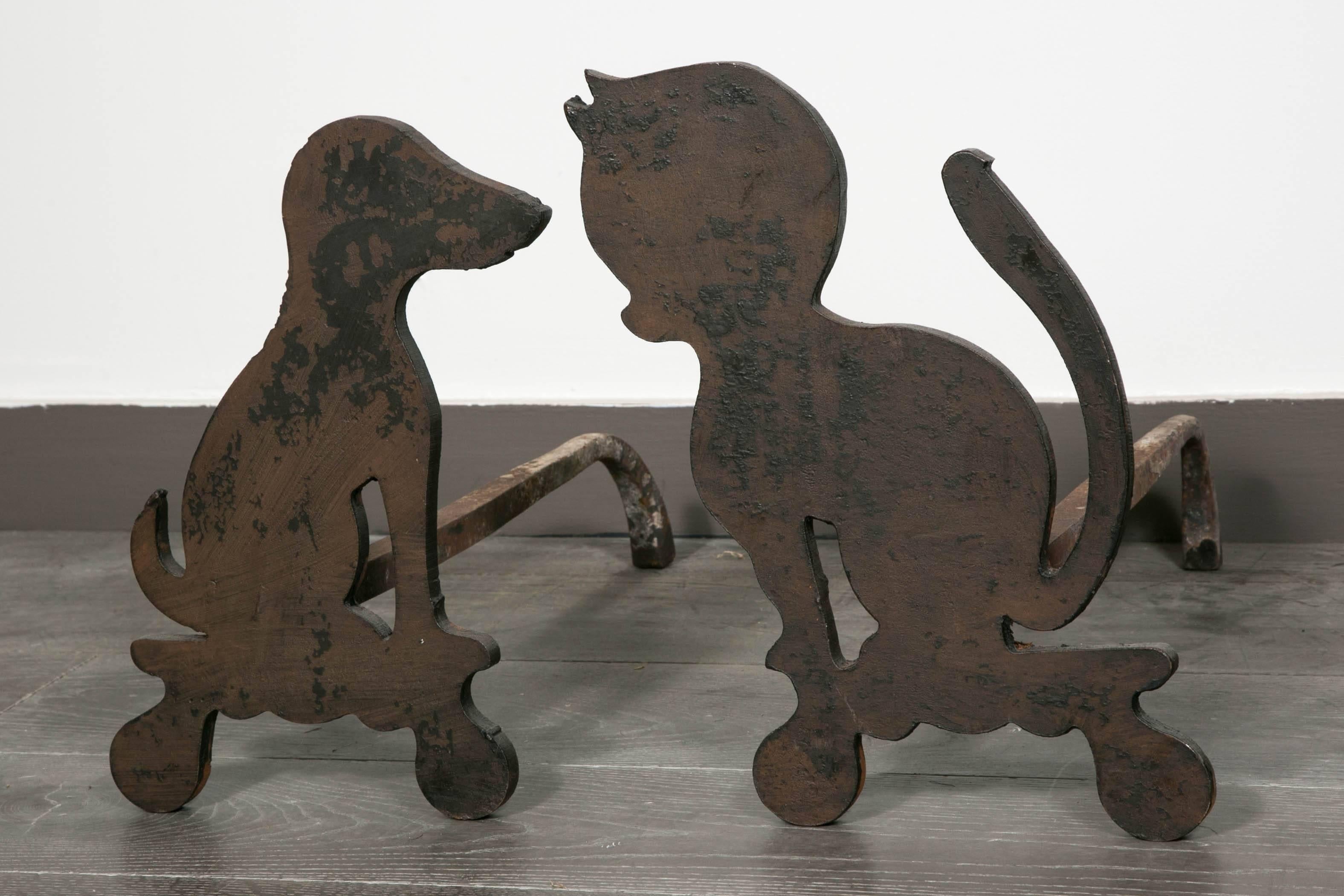 Rare pair of firedogs with a dog and a cat, original iron with patina,
France, circa 1950.
Heavy quality.