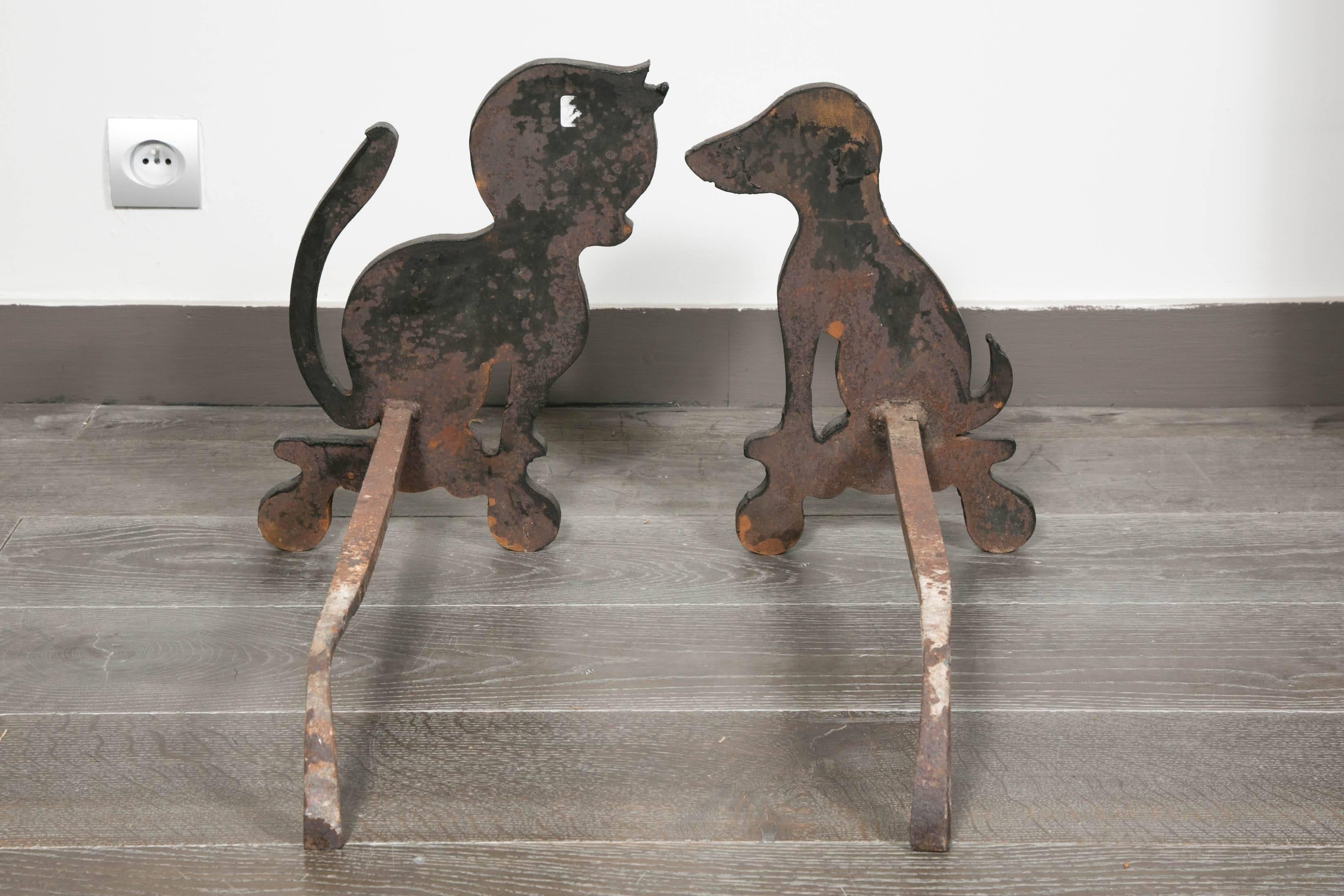 Mid-20th Century Funny Pair of Iron Firedogs For Sale