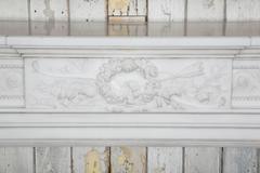 Pair of Antique Louis XVI Statuary Marble Fireplace Surrounds