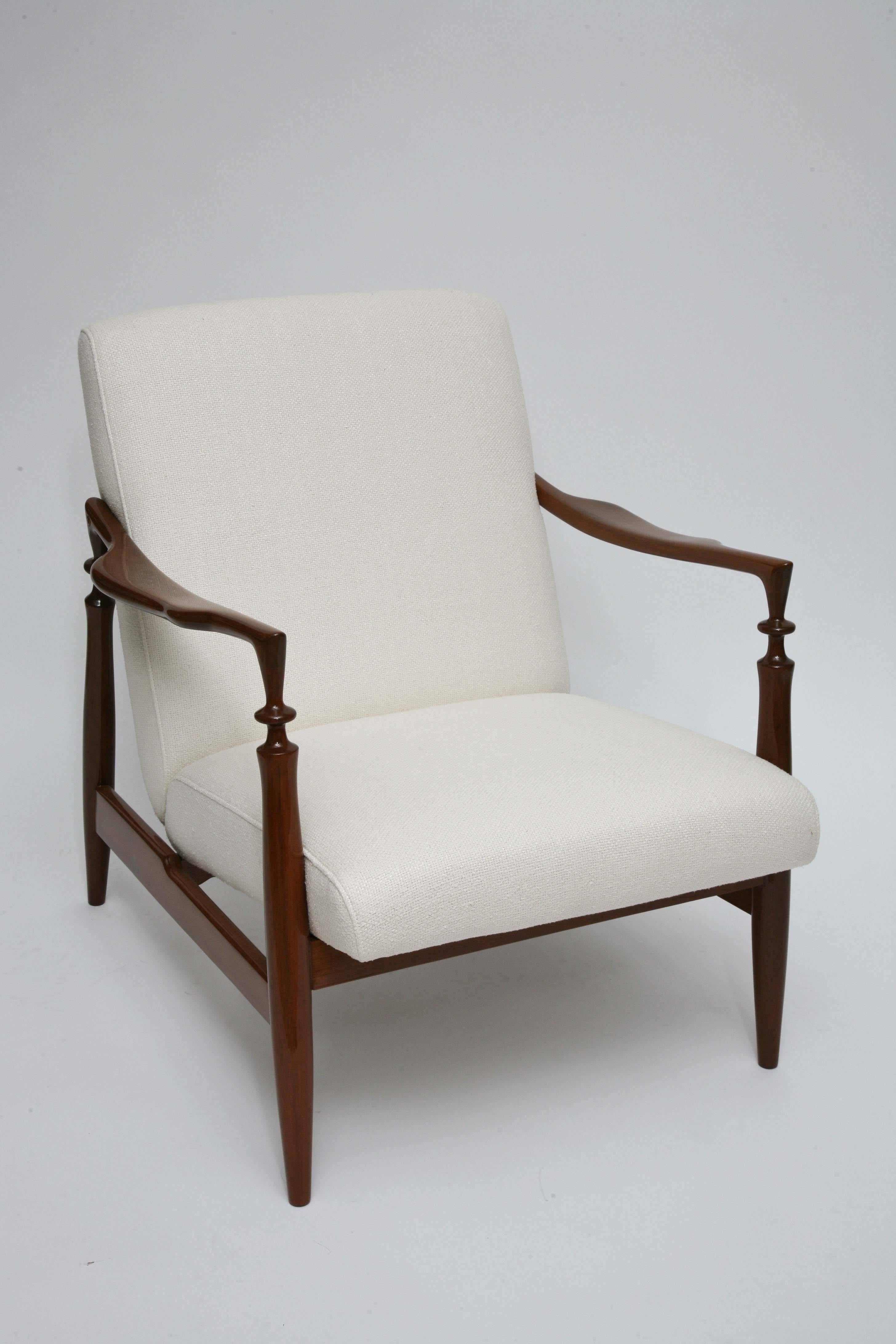 We couldn't resist the understated glamour of this unique pair of 1960s Italian armchairs with gorgeous turned wood detailing, front and back. Fully restored European walnut frames with soft, off-white silk upholstery. (Swatches available).