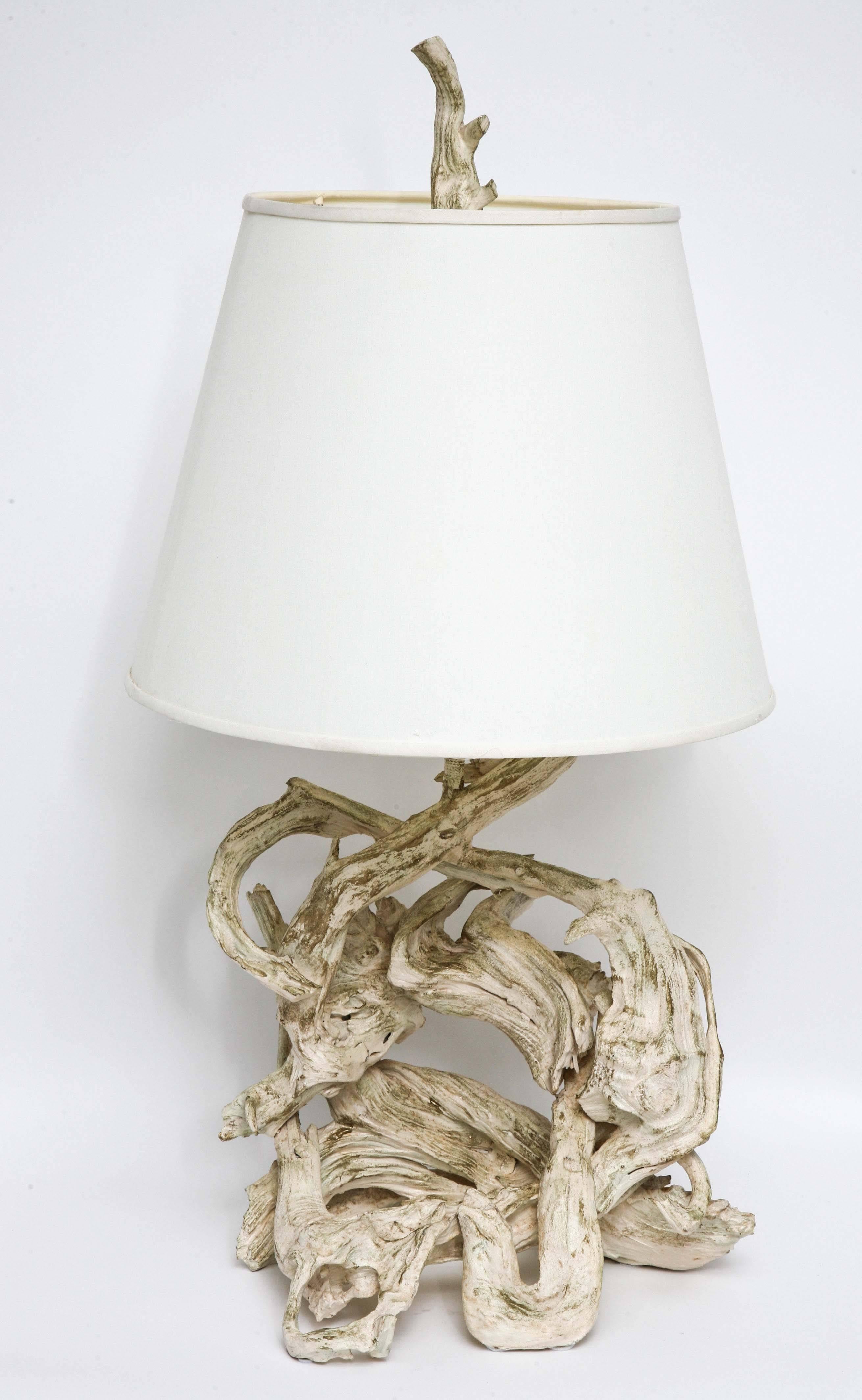 Sculptural 1950s driftwood lamp and matching finial with original white paint with gold brushed highlights, mellowed with age to cream and pale bronze. (Shade not included!).
