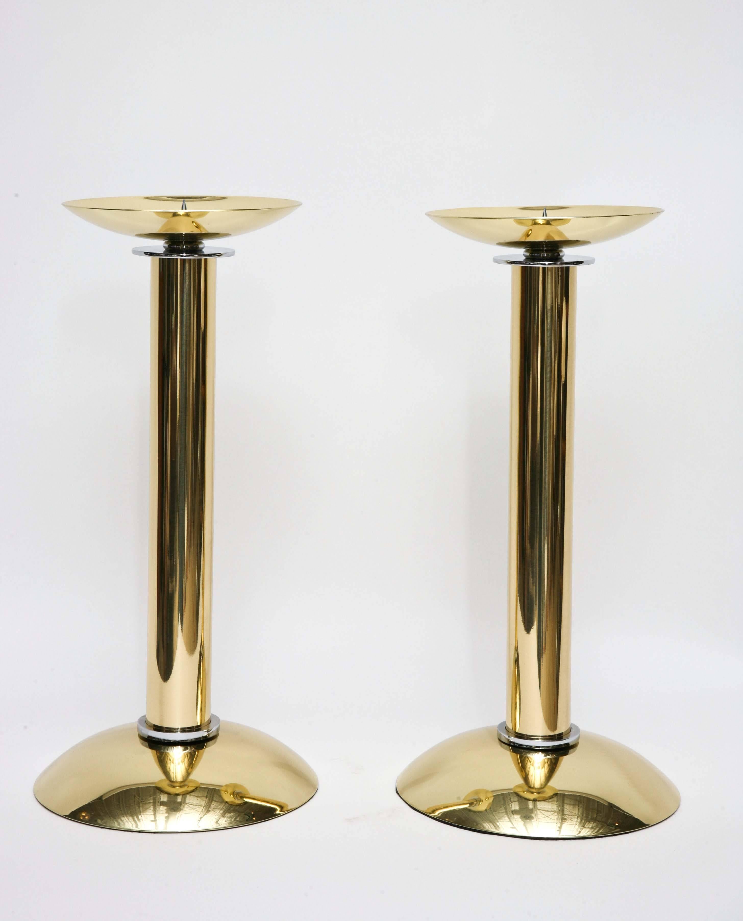 Pair of Karl Springer polished brass and steel prickets, circa 1980. Professionally polished.