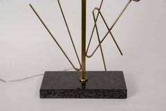 Pair of brass sculptural lamps