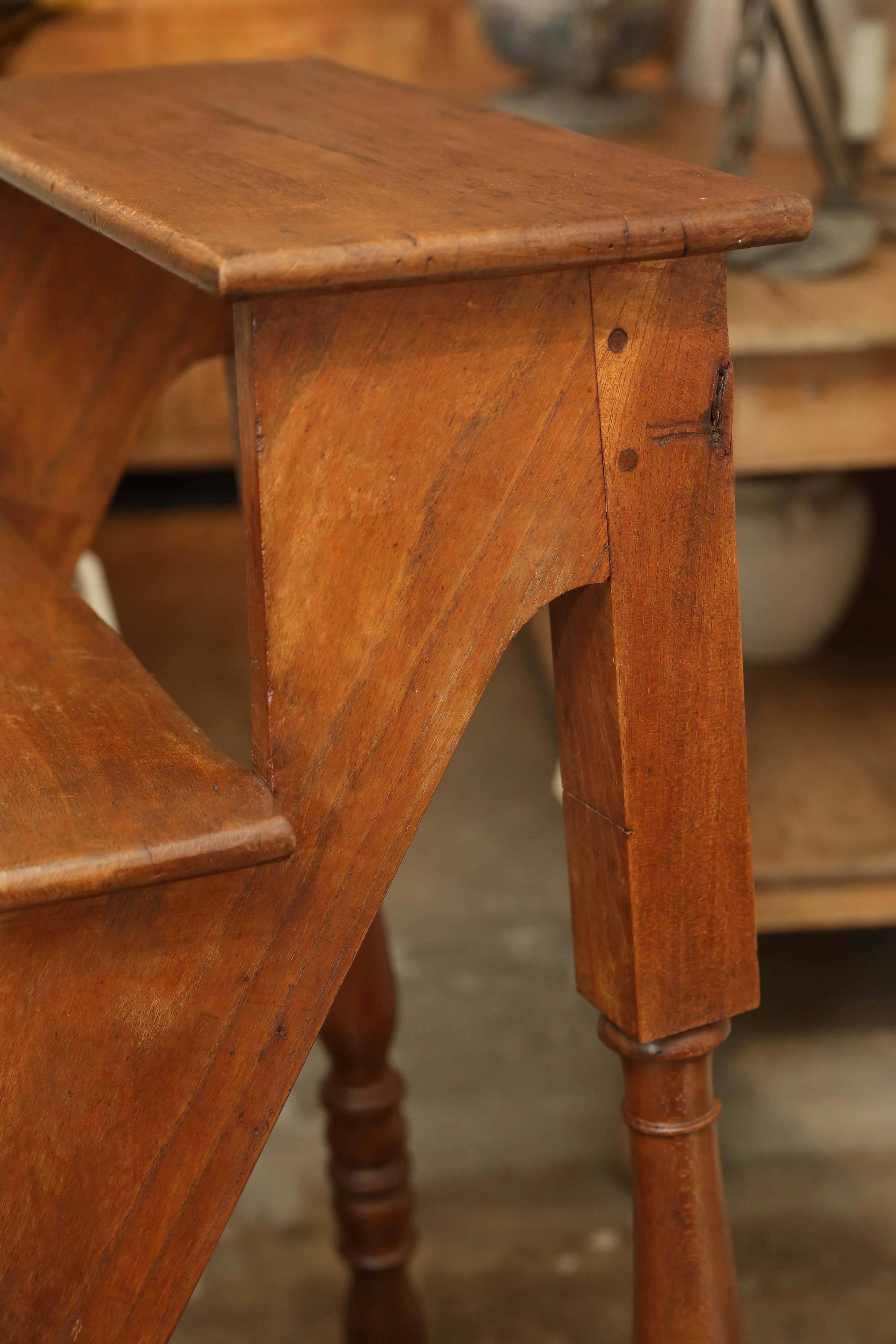 Antique 19th century library stairs in elm. Peg and Dowel construction. Six levels. Turnstile support. Great to use as a table next to an upholstered piece to add height in a room!