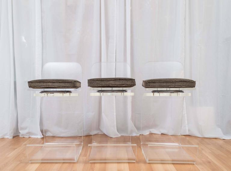 Set of 3 Lucite Swivel Counterheight Bar Stools in the Manner of Paul