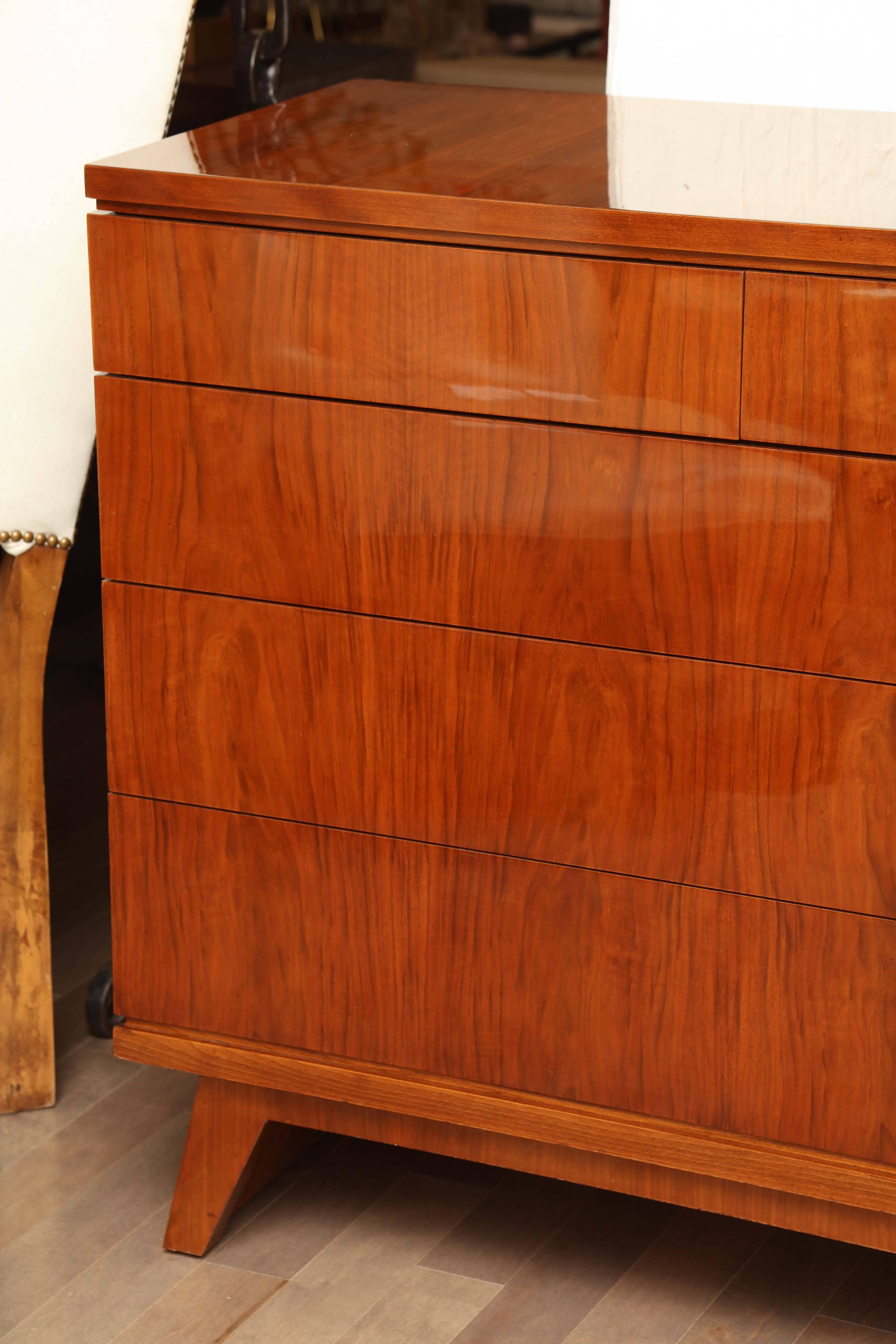Art Deco chest with five drawers in a lacquered walnut finish, circa 1940s.