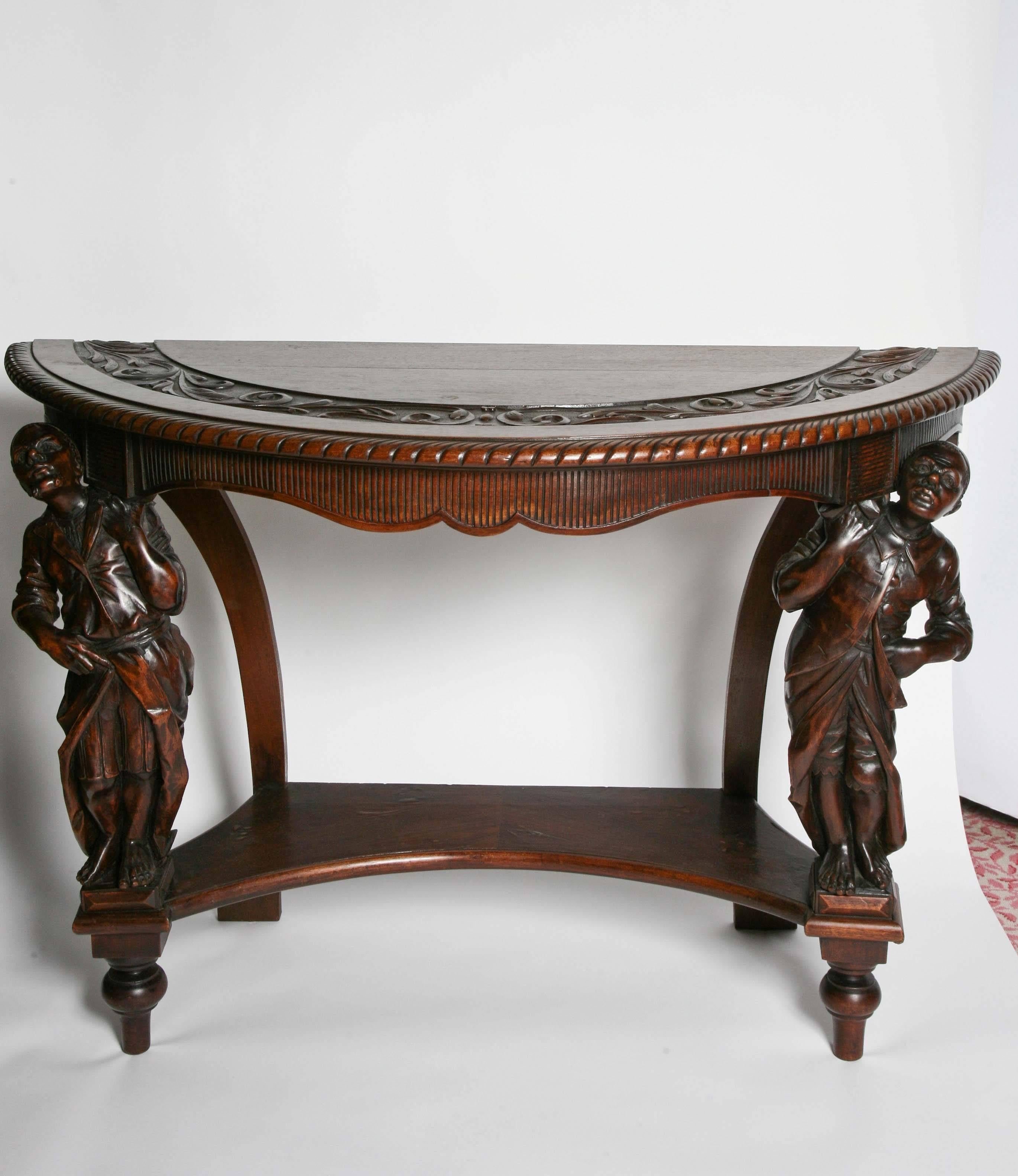 Finely detailed and hand-carved with opposing Moroccan figures - each garbed differently and with outstanding features - one with goatee, and with a somewhat ebony like finish. Unique.