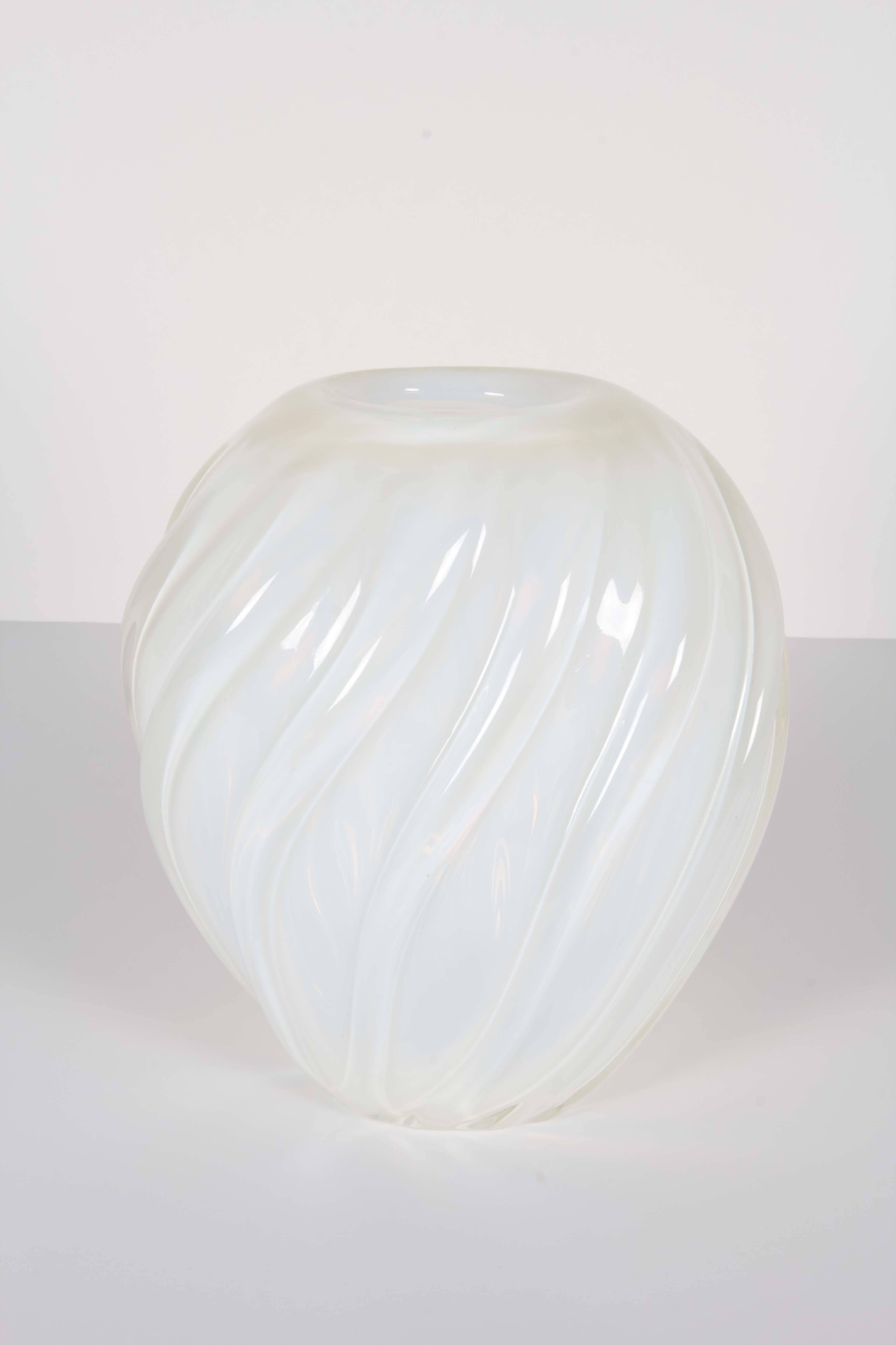 Murano handblown opalescent white glass vase. Has a beautiful ribbed design.

Not available for sale or to ship in the state of California.