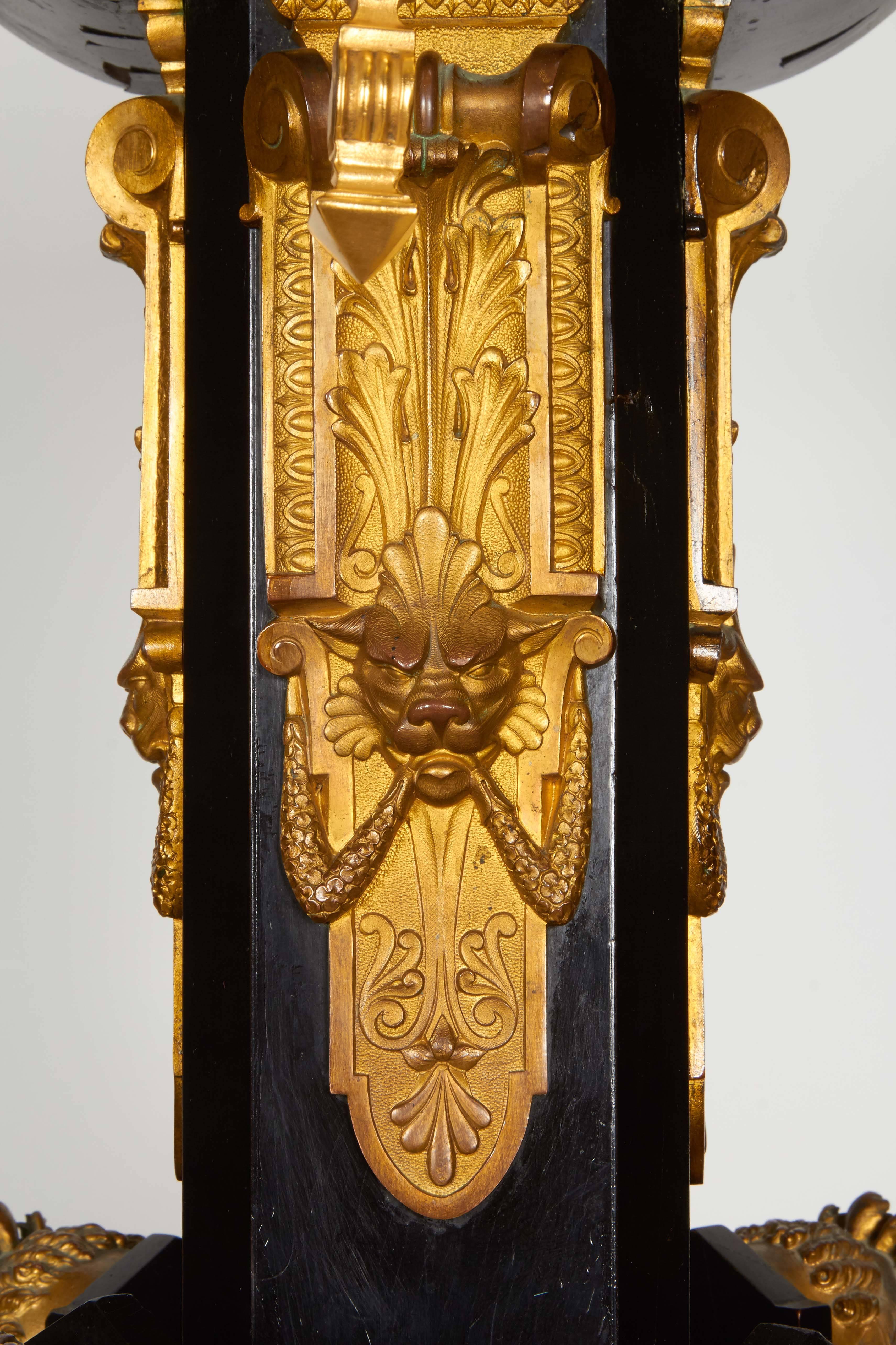 19th Century Highly Important Pair of Neo Grec Ormolu and Porcelain Mounted Ebony Torchieres