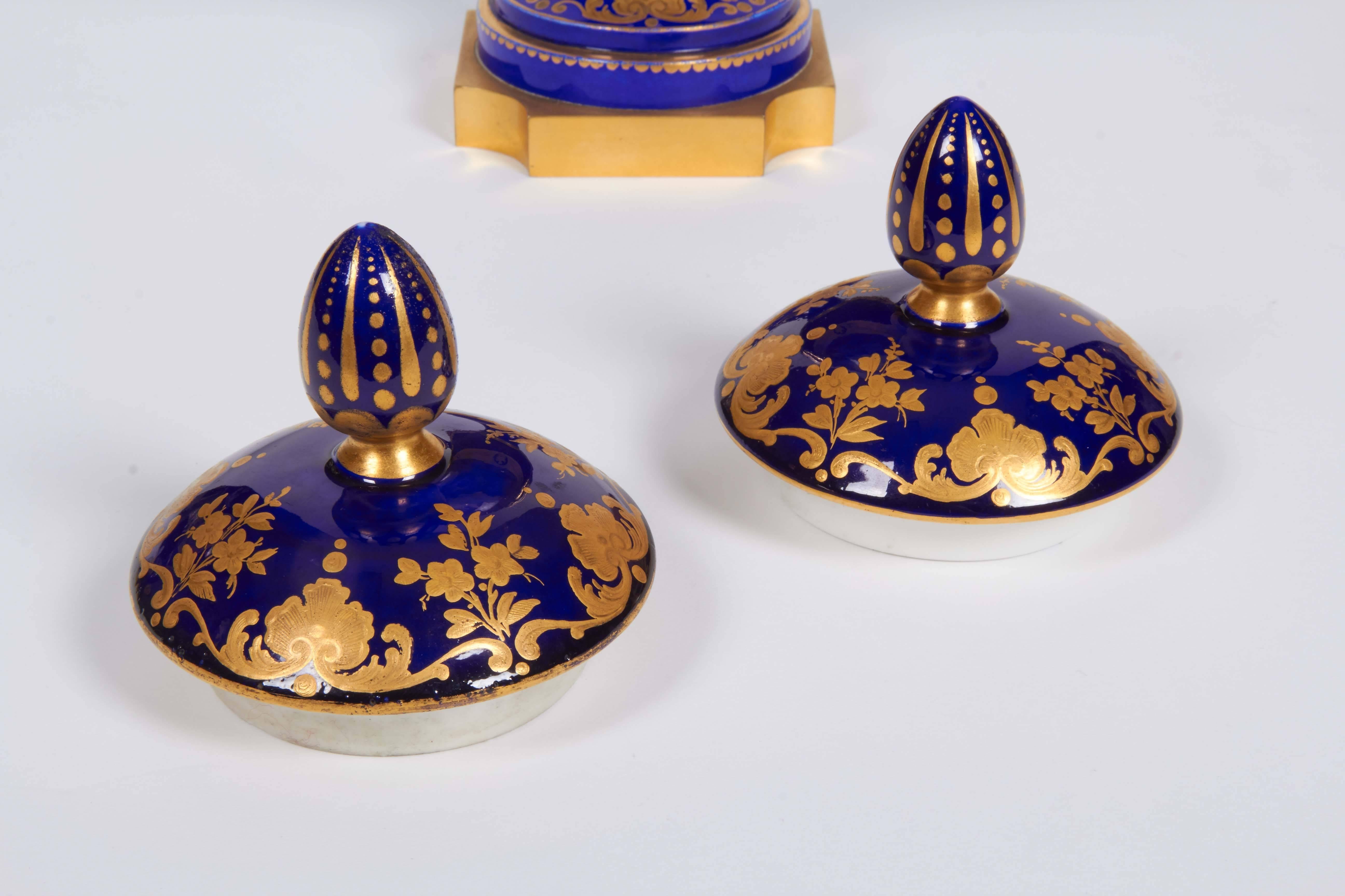 Pair of Napoleon III Sevres Porcelain Cobalt Blue Vases and Covers on Ormolu In Good Condition In New York, NY