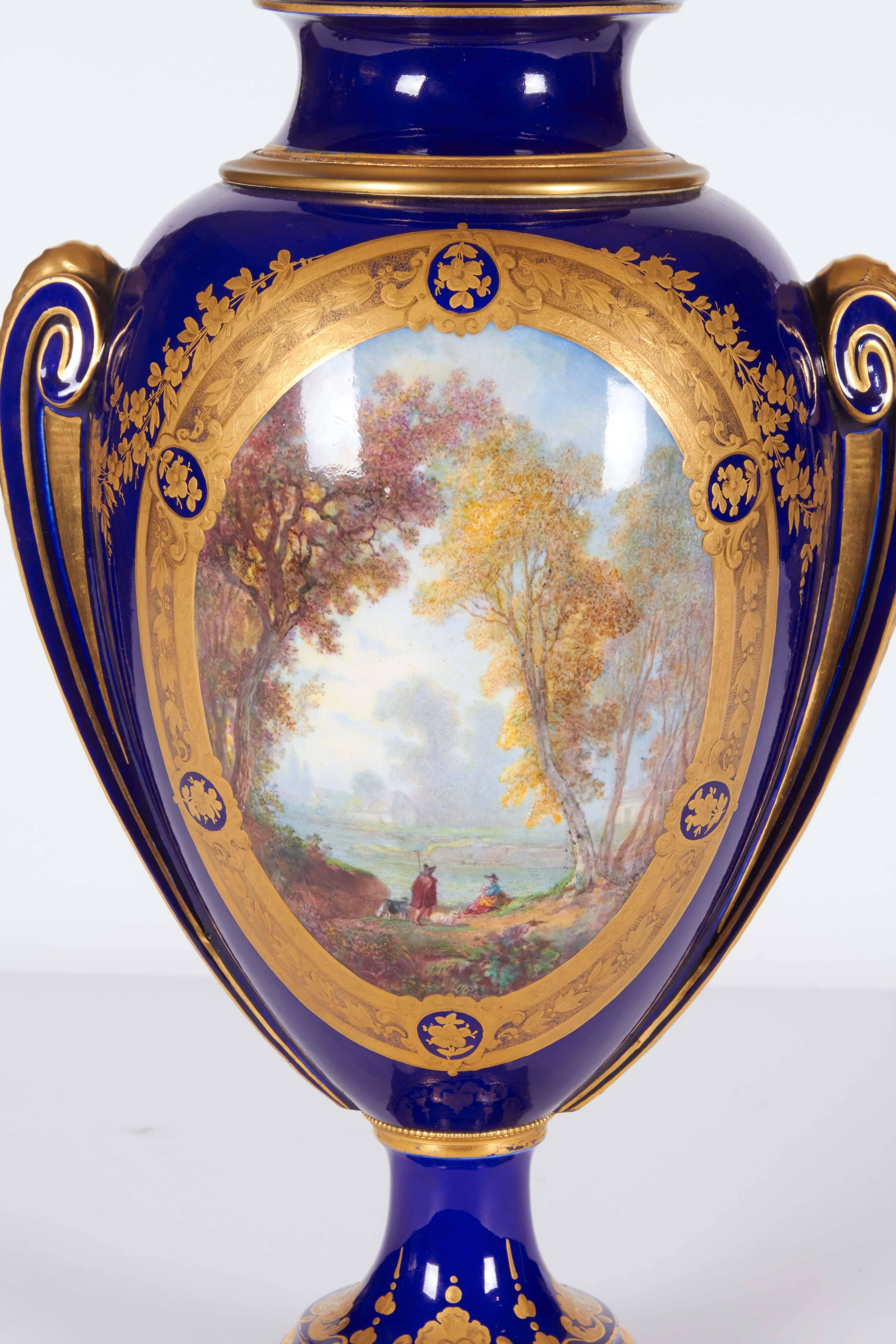 Pair of Napoleon III Sevres Porcelain Cobalt Blue Vases and Covers on Ormolu 1