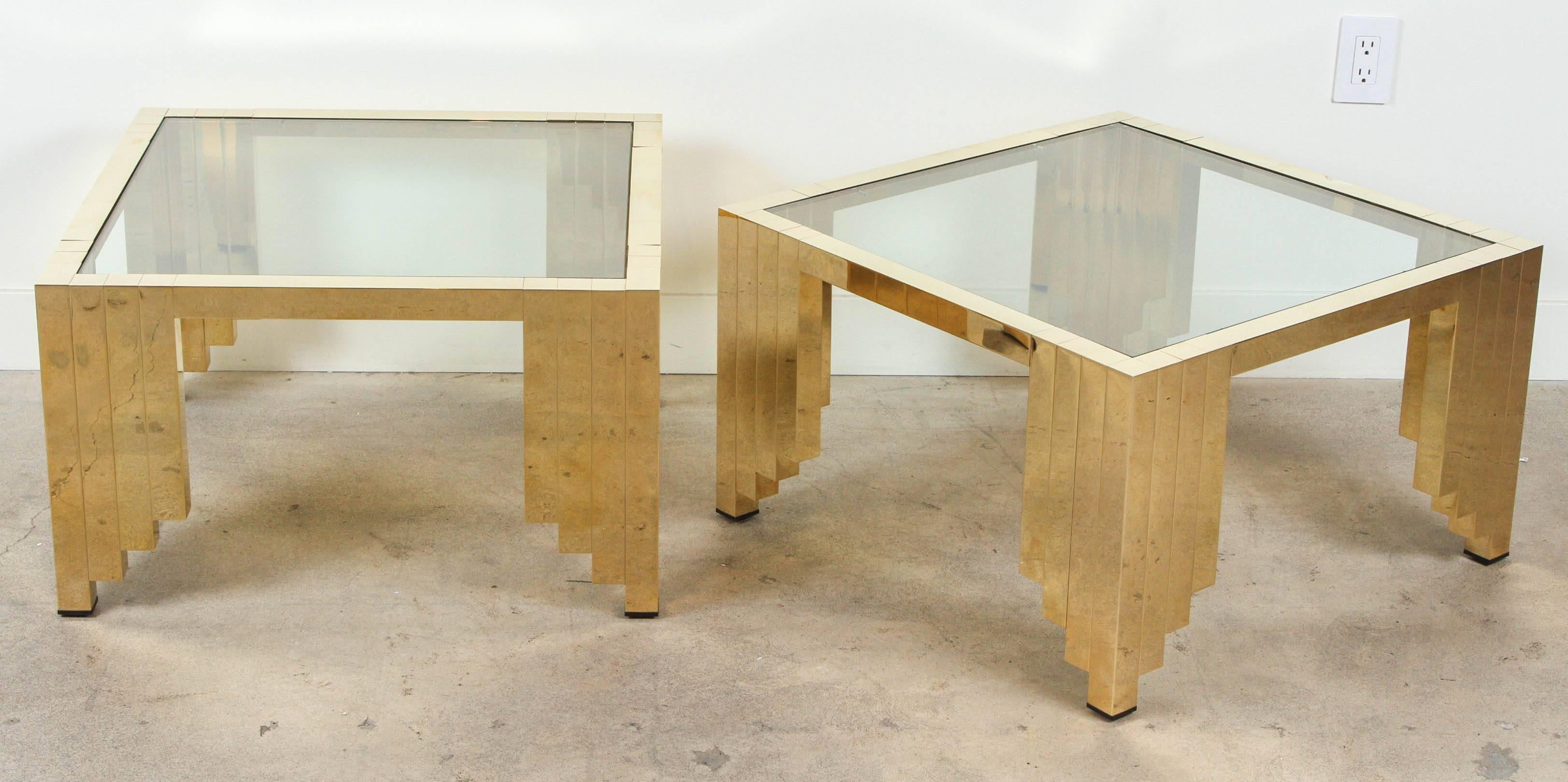 Pair of 1970s polished brass and glass side tables. Matching coffee table also available.