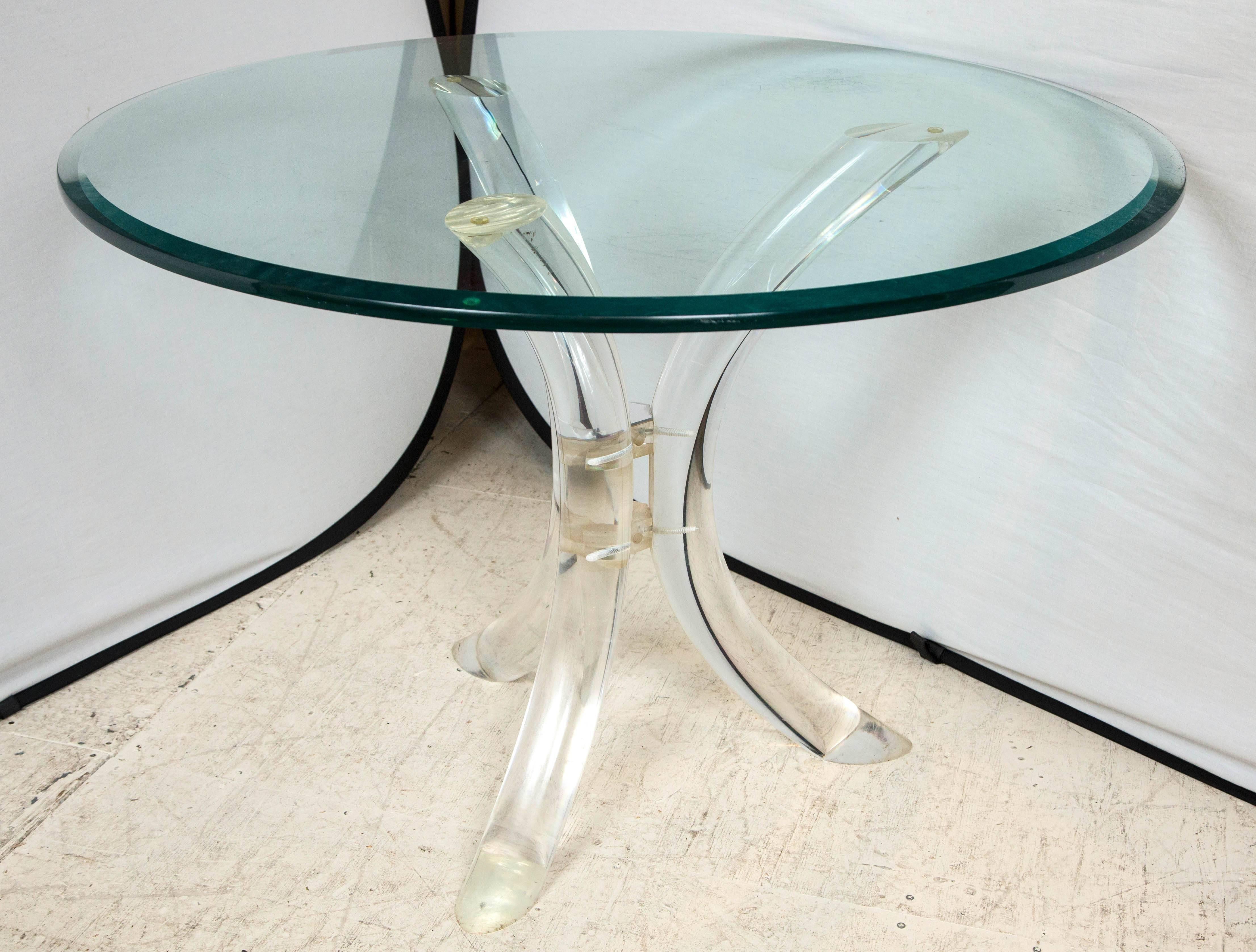 Beautiful Lucite based table with thick beveled glass top.