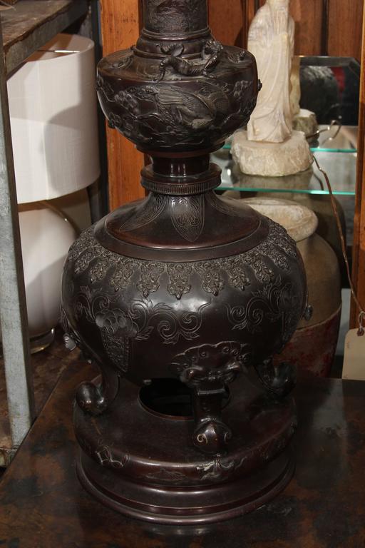Wonderful 19th century oil lamp wired for electricity in early 20th century.

See artist signature in images.

Lamp is 42 tall, with shade height is 53 inches.