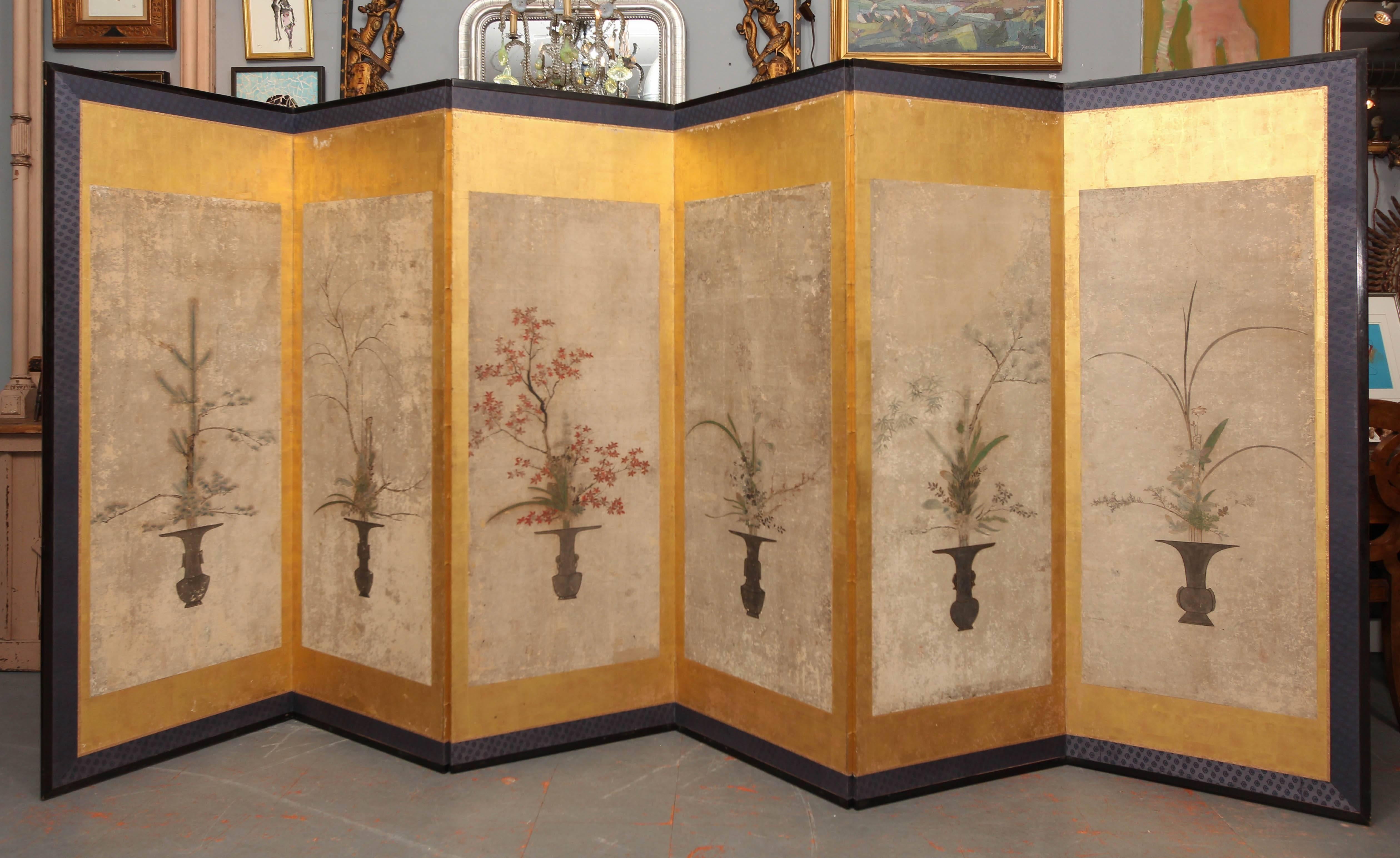 Large six-panel byobu. Six hand-painted Ikebana with gold leaf and enameled frame. Fabulous mounted flat on wall or used as screen on floor.
