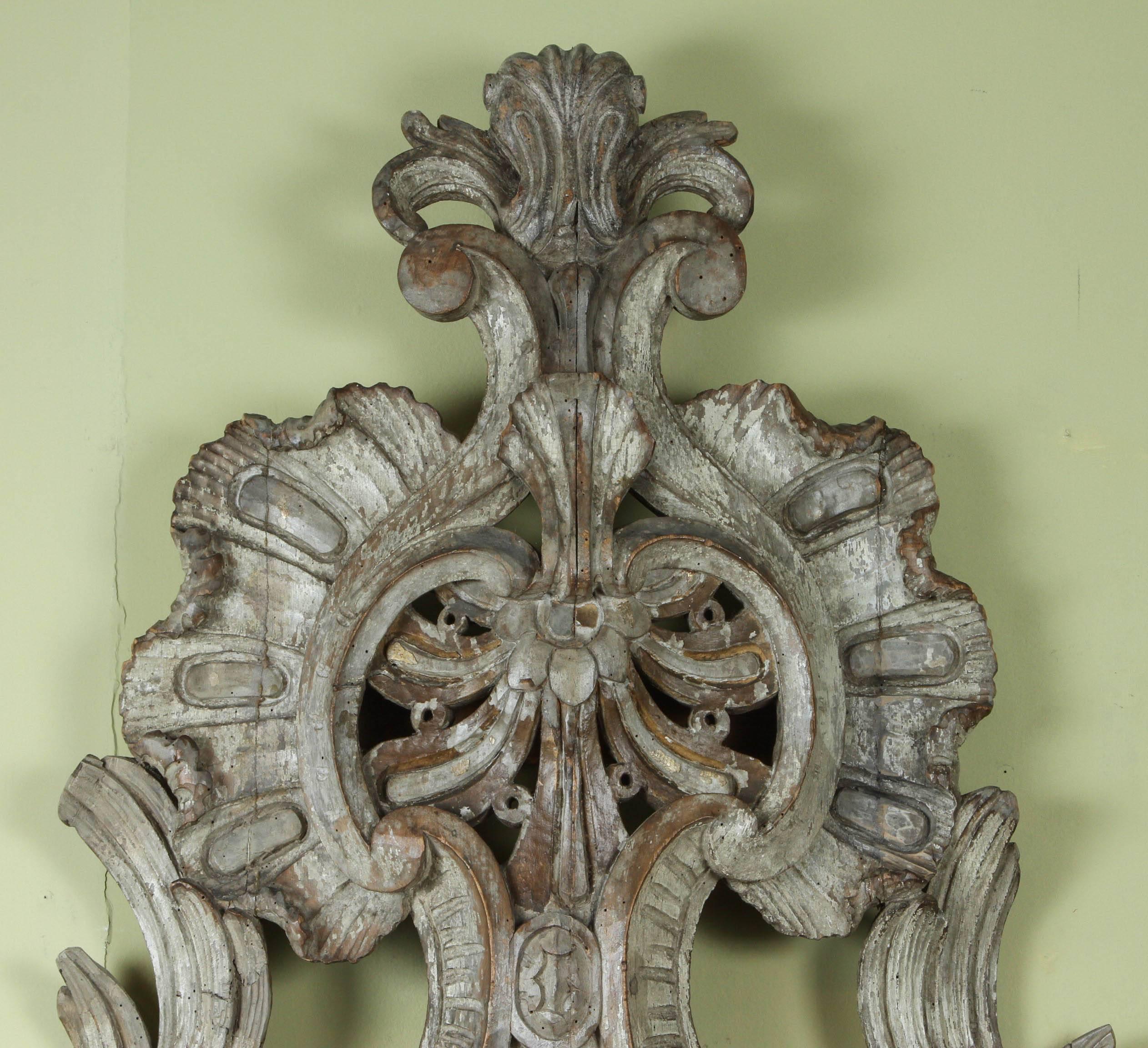 A Pair of 18th century Italian carved and painted three candle applique, circa 1760.