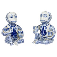 Pair of Vintage Chinese Style Blue and White Monkey Candlestick Holder