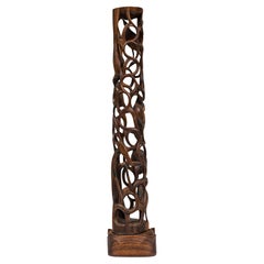 Scultura contemporanea in legno intagliato a mano su base in stile Makonde