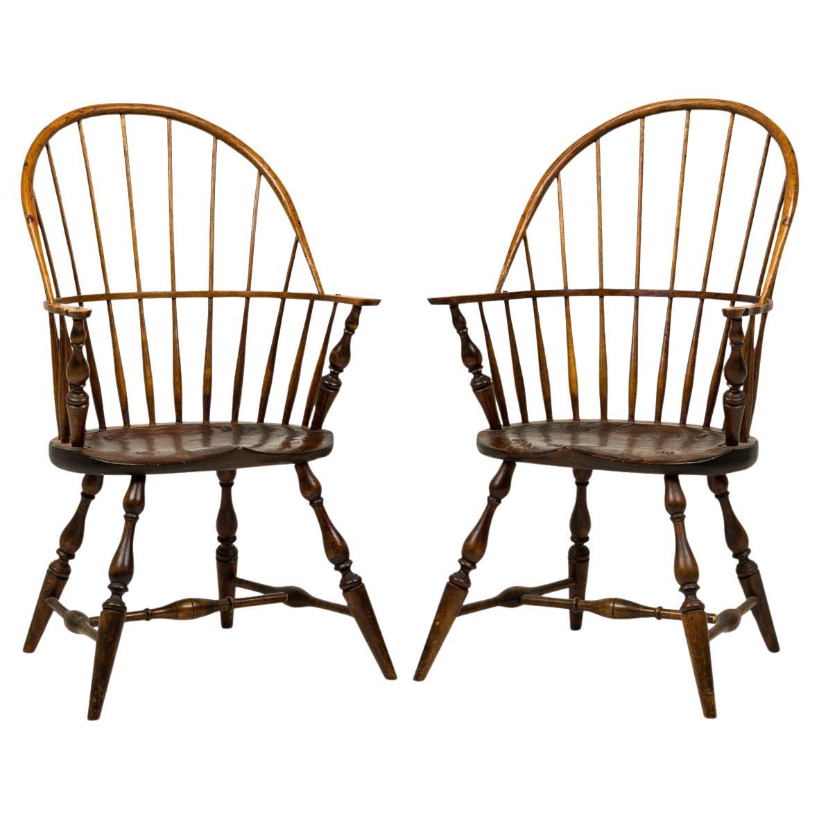 Pair of English Country Windsor Back Carved Oak Dining Armchairs