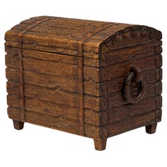 Rustic Black Forest Wood Trunk with Hand Carved Exterior and Ring Handles