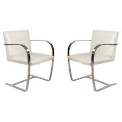 Pair of Mid-Century Chrome and White Leather Armchairs