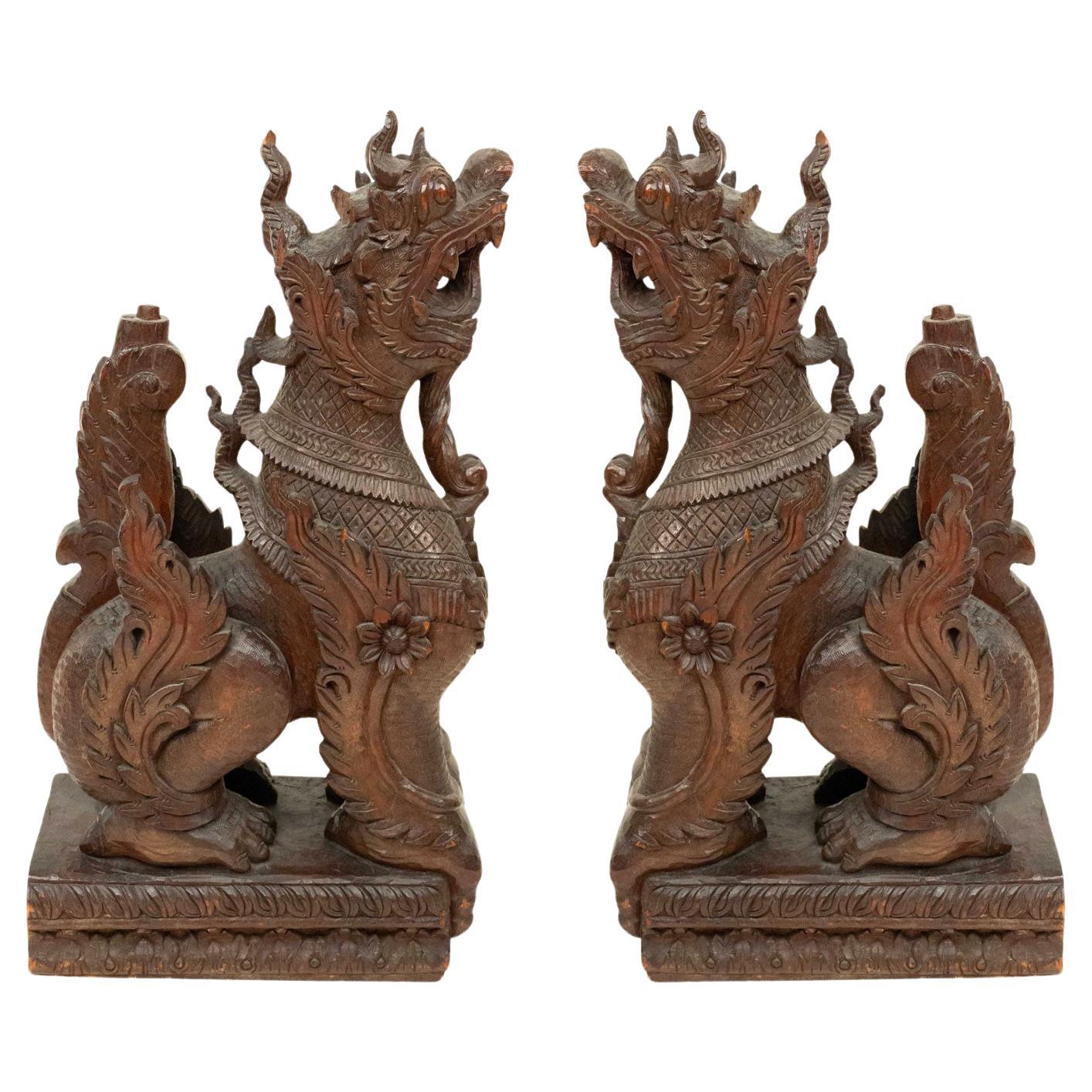 Pair of Burmese Carved Foo Dog Figures