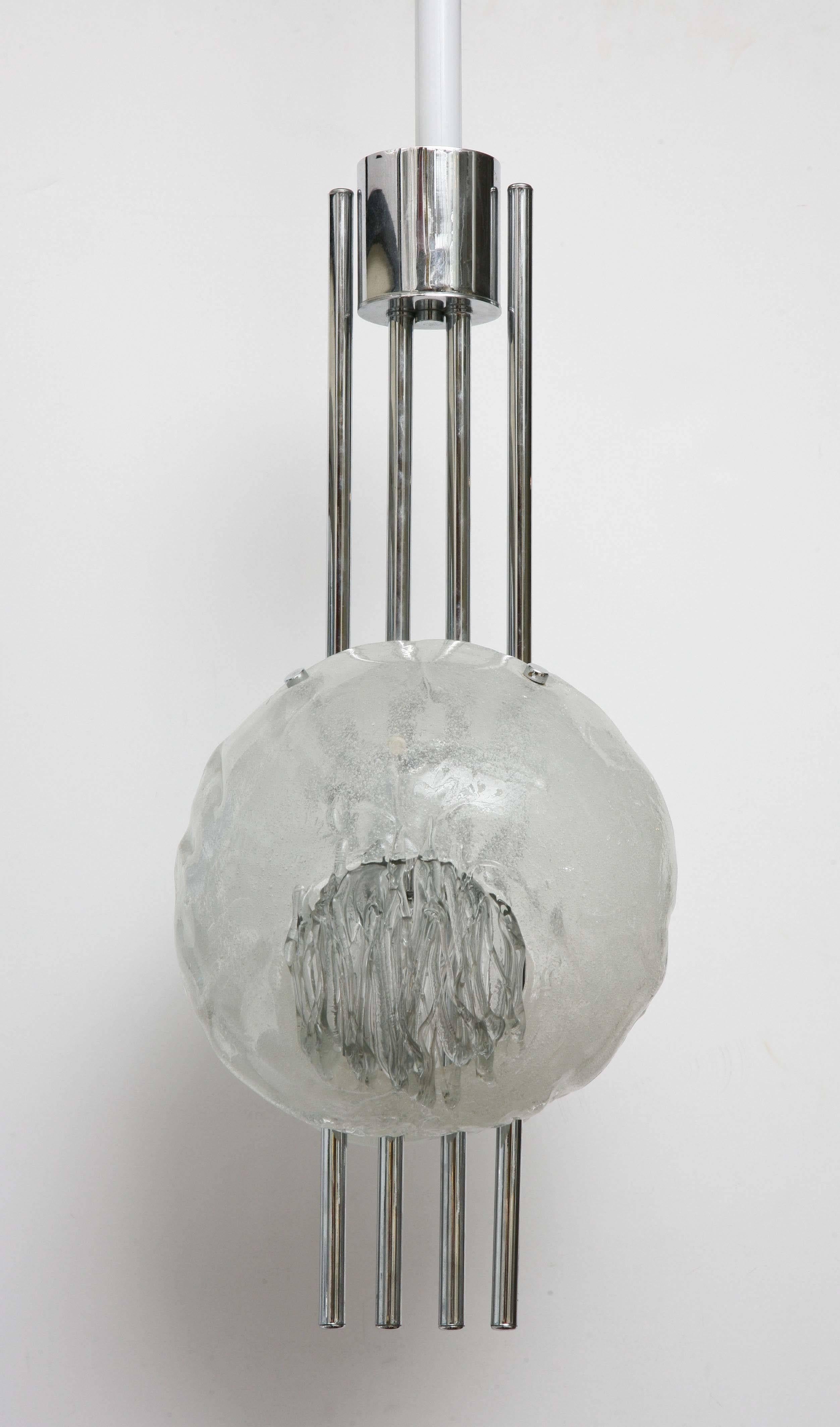 Mid-Century Modern chrome and Murano glass pendant light fixture by Angelo Brotto for Esperia.
Wired for the U.S. and uses two light bulbs with max. 60 wattage.
The glass pieces have a myriad of different details.
   
L-618-335-SAM