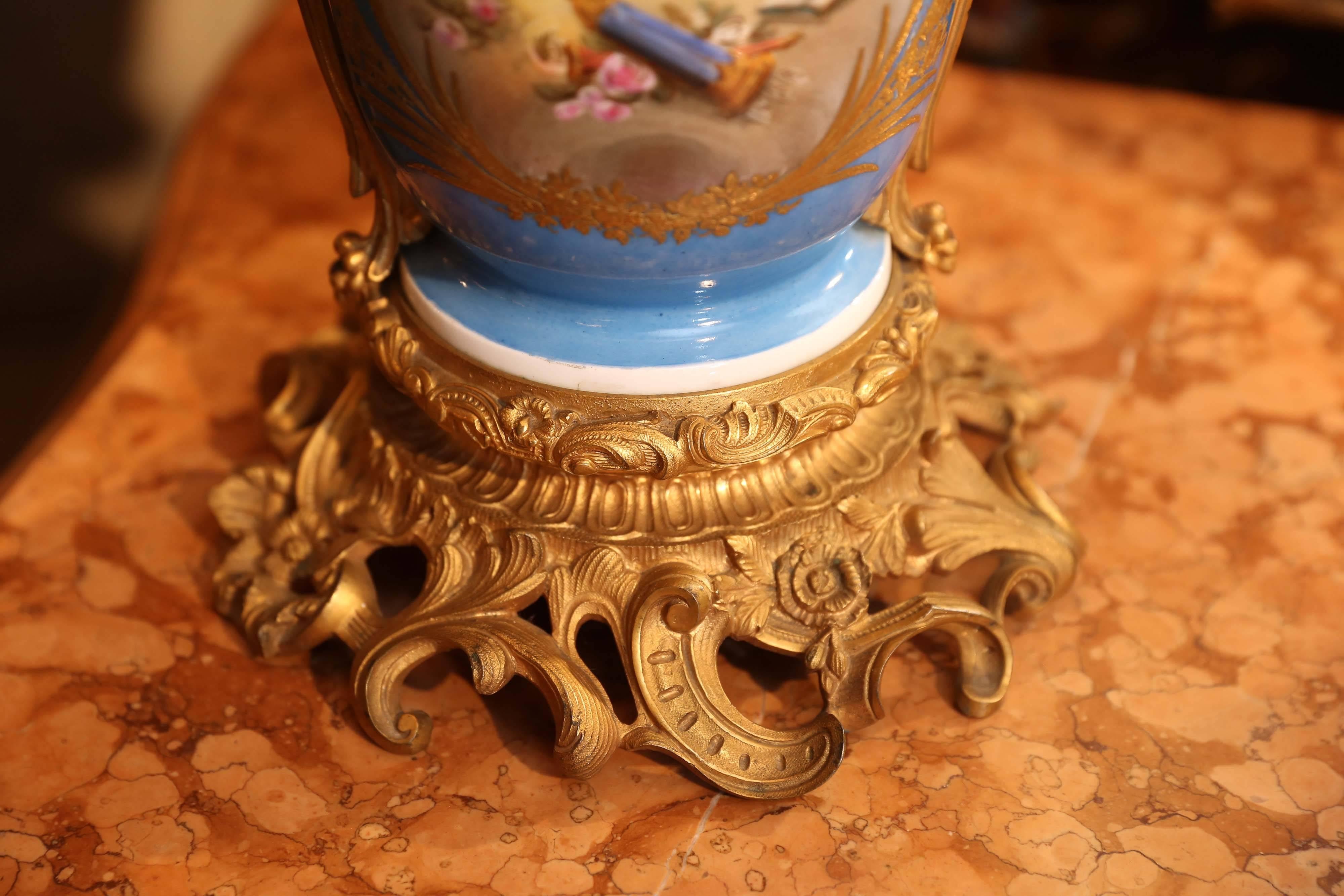 Gilt French Sèvres Porcelain Lamp in Celeste Blue with Hand-Painted Reserves For Sale