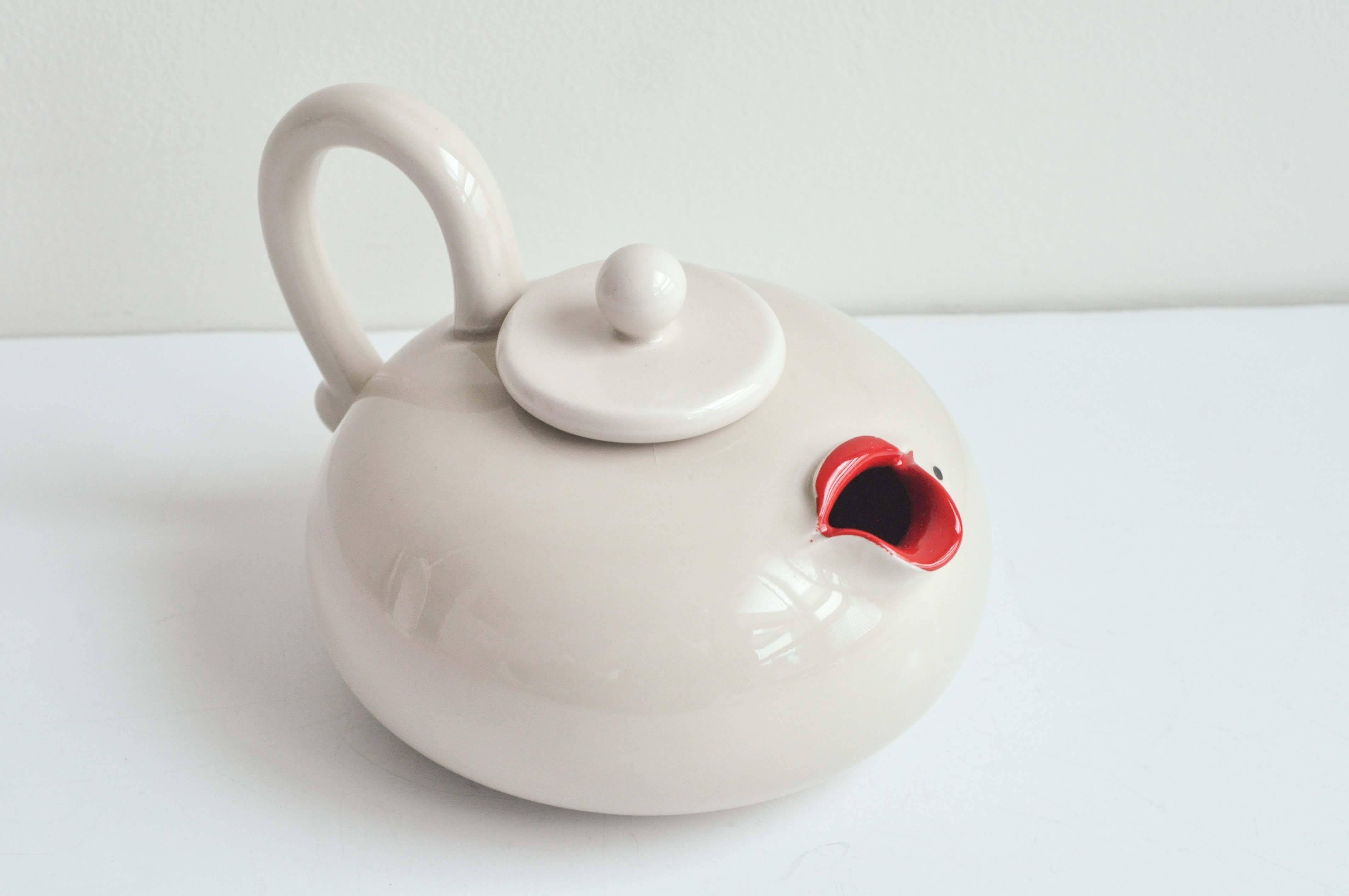 A novelty teapot designed by Fitz and Floyd that alludes to Marilyn Monroe's lips complete with beauty mark. A clever, witty design and a great example of Pop Art from the seventies in excellent condition. Incised mark and original paper label.