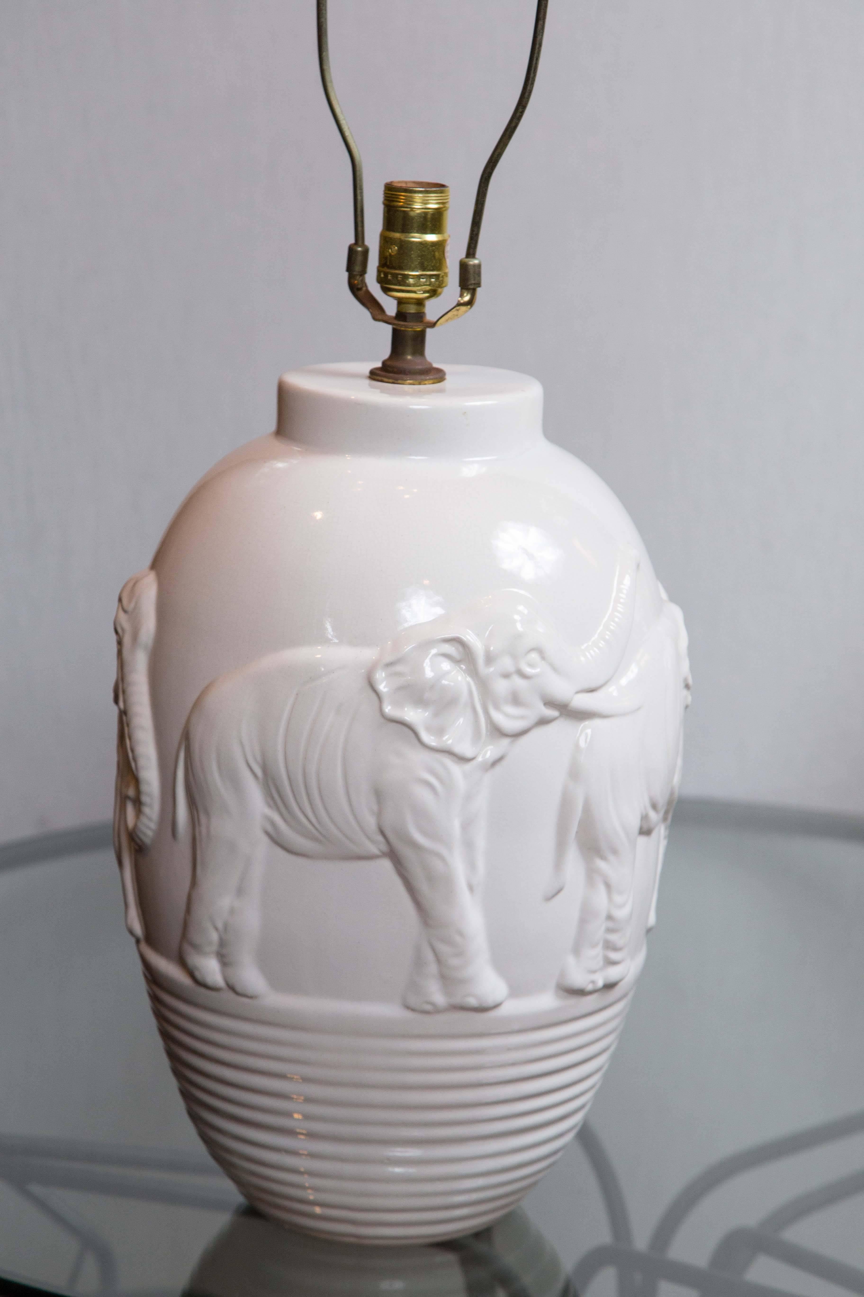 white ceramic elephant lamp