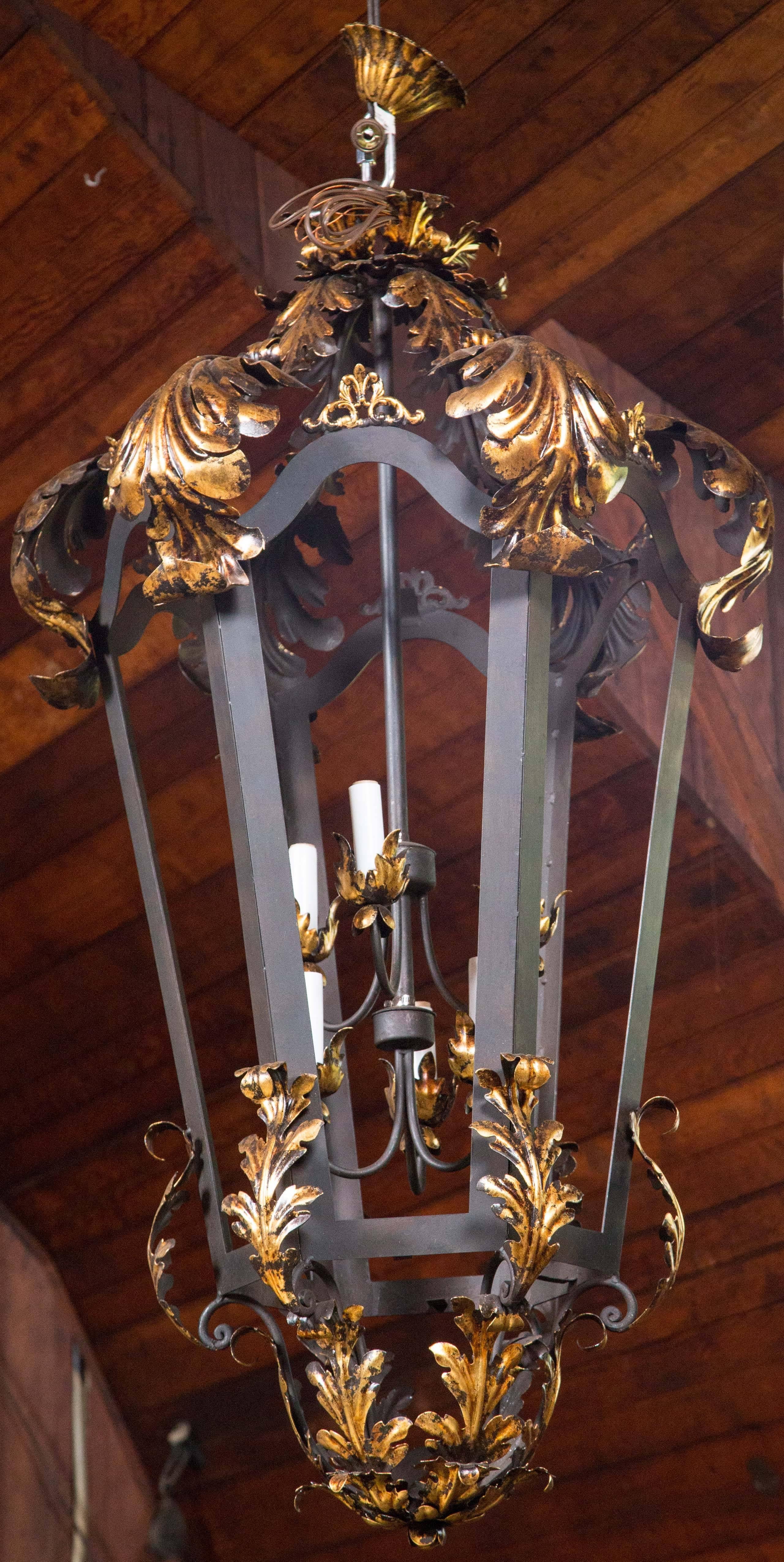 Huge black and gold French chandelier with six lights. New old stock. No glass. Can provide the glass.