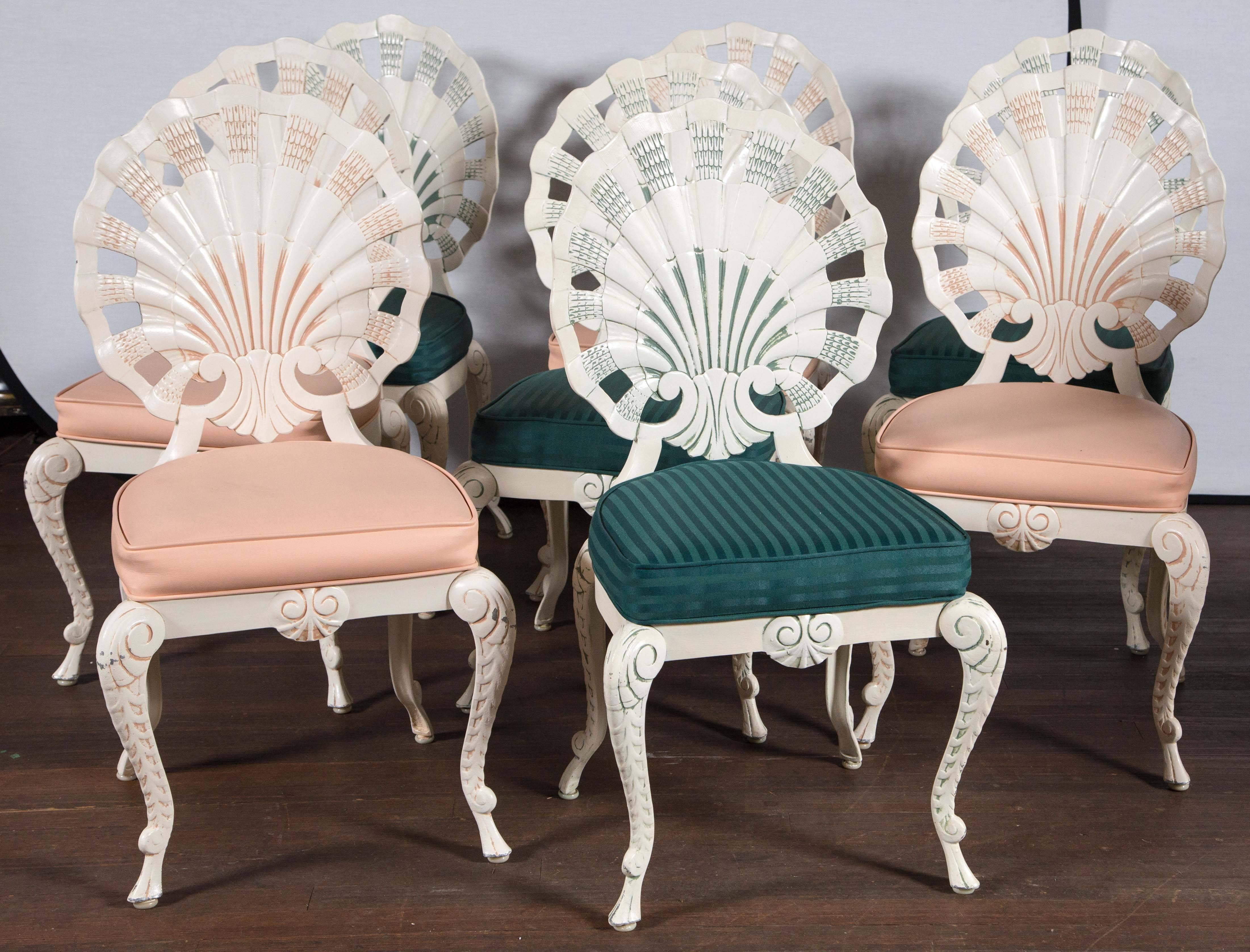 Measures: 18.5 seat height, 18.25 back width.
Two sets of four grotto shell back dining chairs.