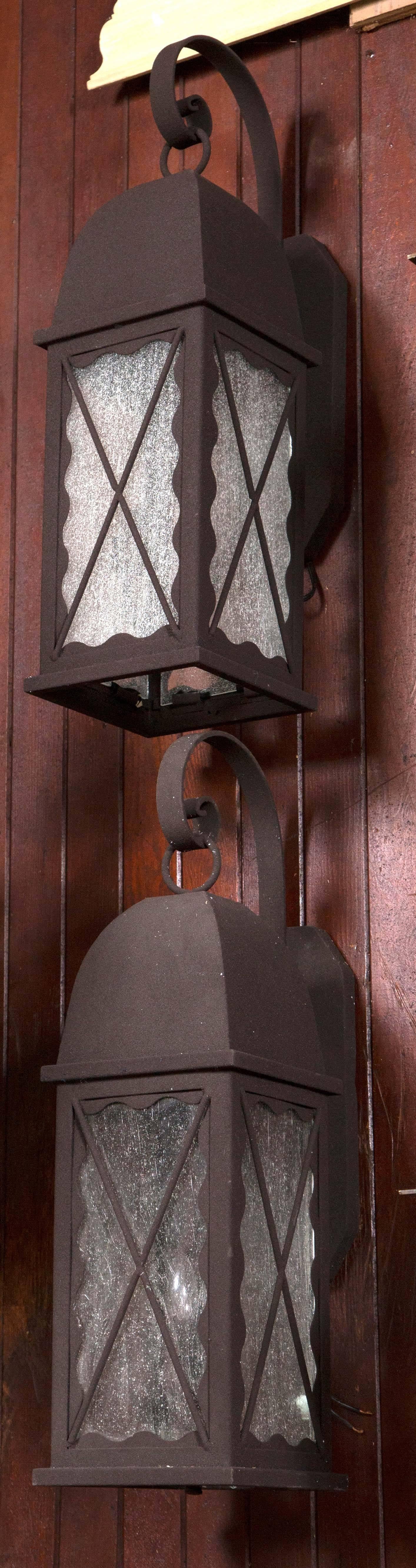 Pair of Iron Exterior Lantern Sconces In Excellent Condition In Stamford, CT