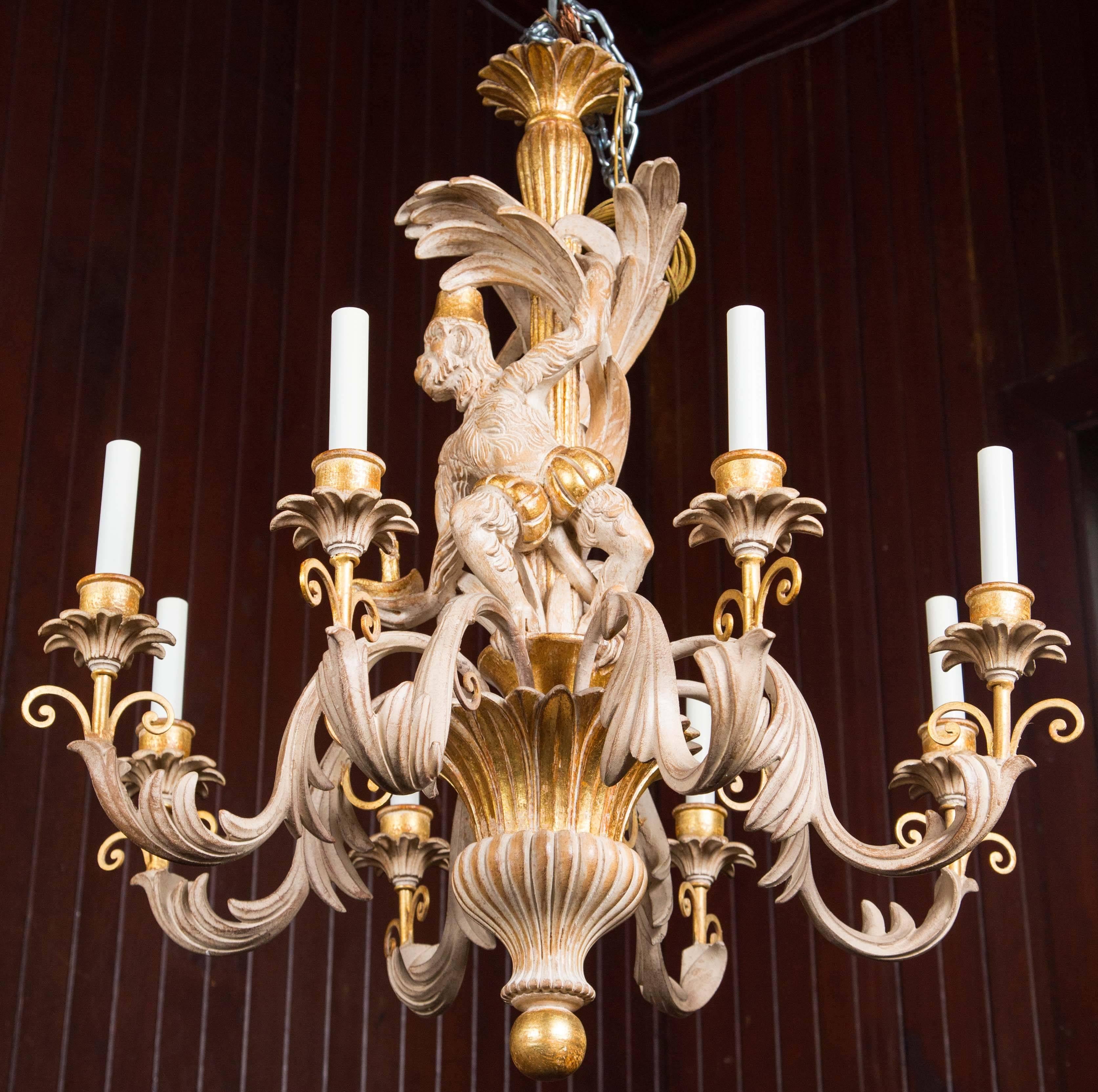 Italian carved, solid wood Monkey chandelier, light finish with gilding eight lights.
New-old stock from 1970s.
