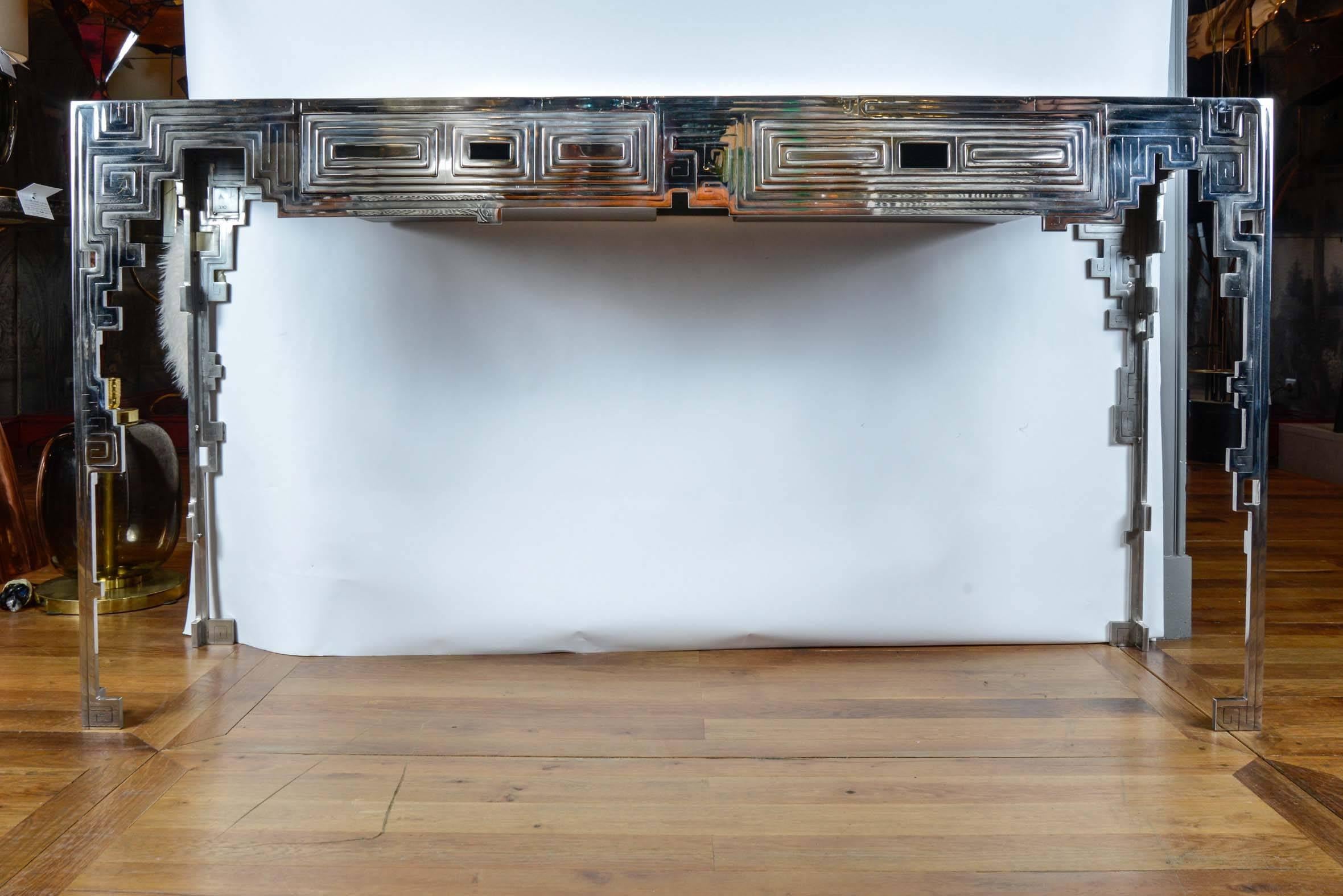 Console in steel and lapis lazuli; two front drawers, cut steel on the four legs, signed by Erwan Boulloud, 2016.